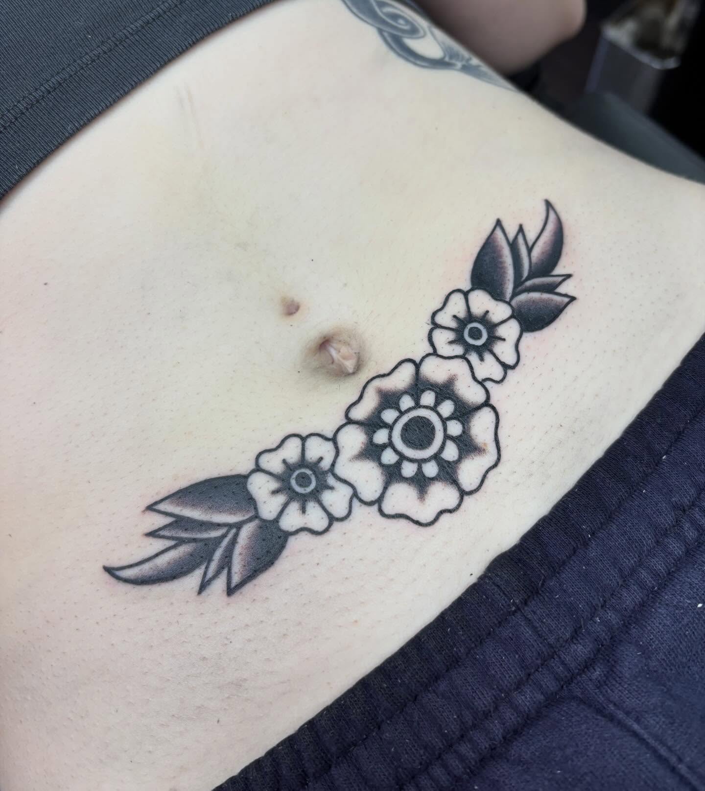 Floral arrangement black and grey tattoo on the ribs by ✨Shelby ✨