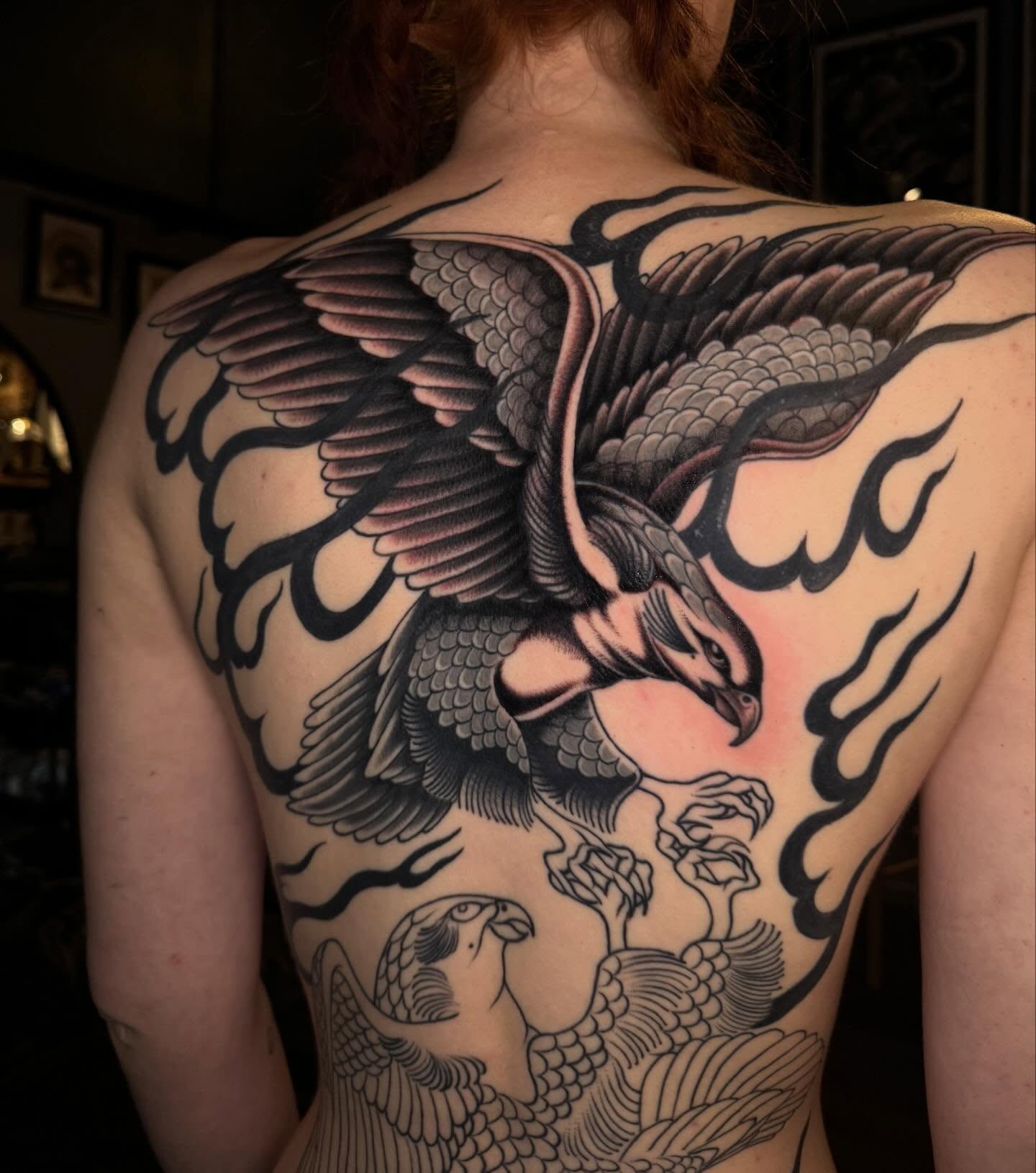 Phoenix American traditional tattoo on the back by Painted Peach Tattooer