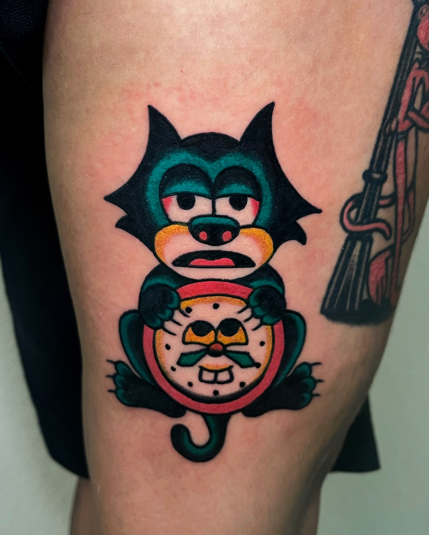 Cat and clock American traditional tattoo on the thigh by Tattoo Dust ☻ Los Angeles