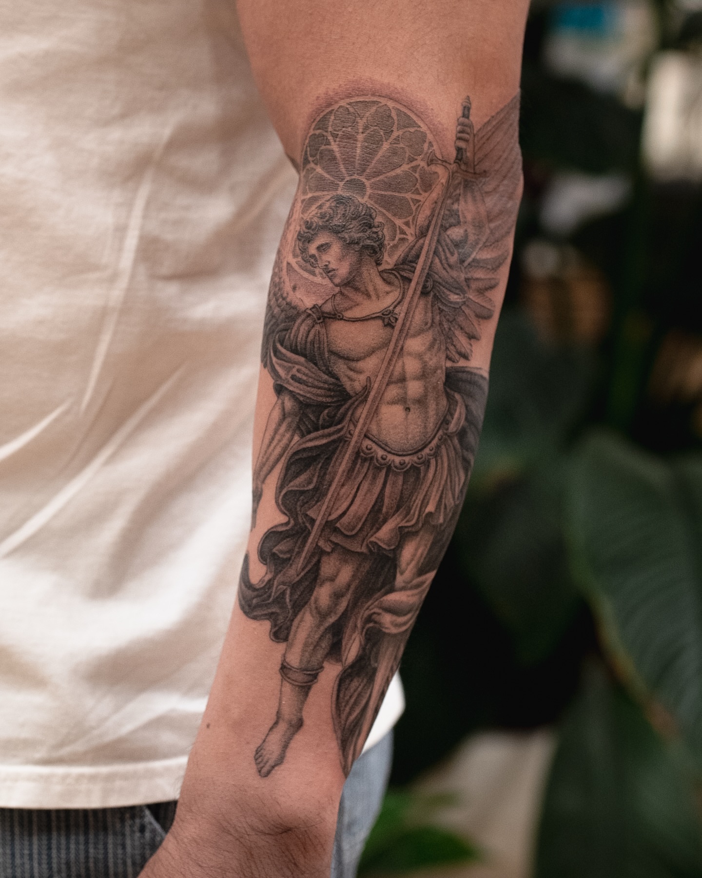 Angelic warrior realism tattoo on the forearm by James Fernella, San Francisco, California
