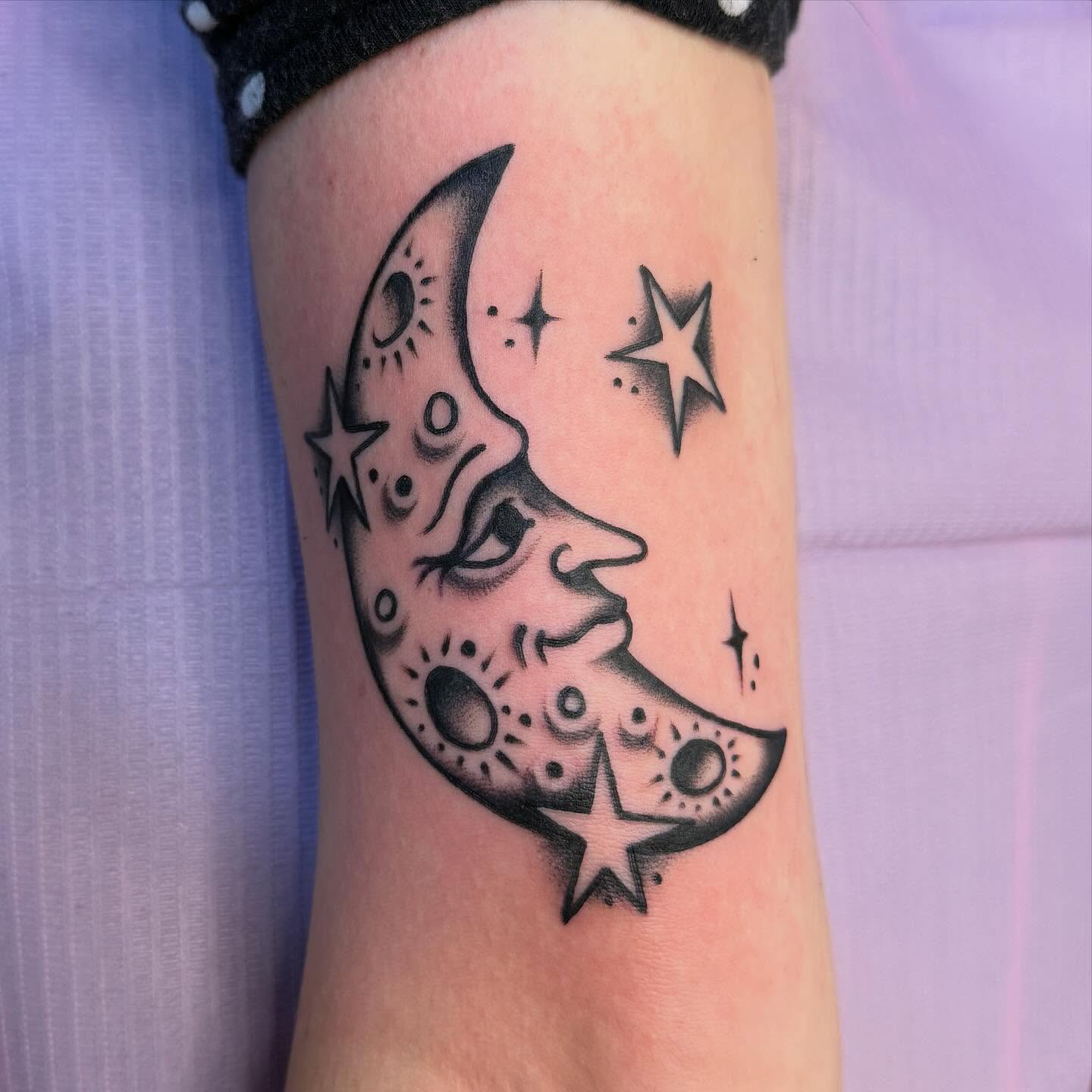 Moon and stars black and grey tattoo on the forearm by clay🚀