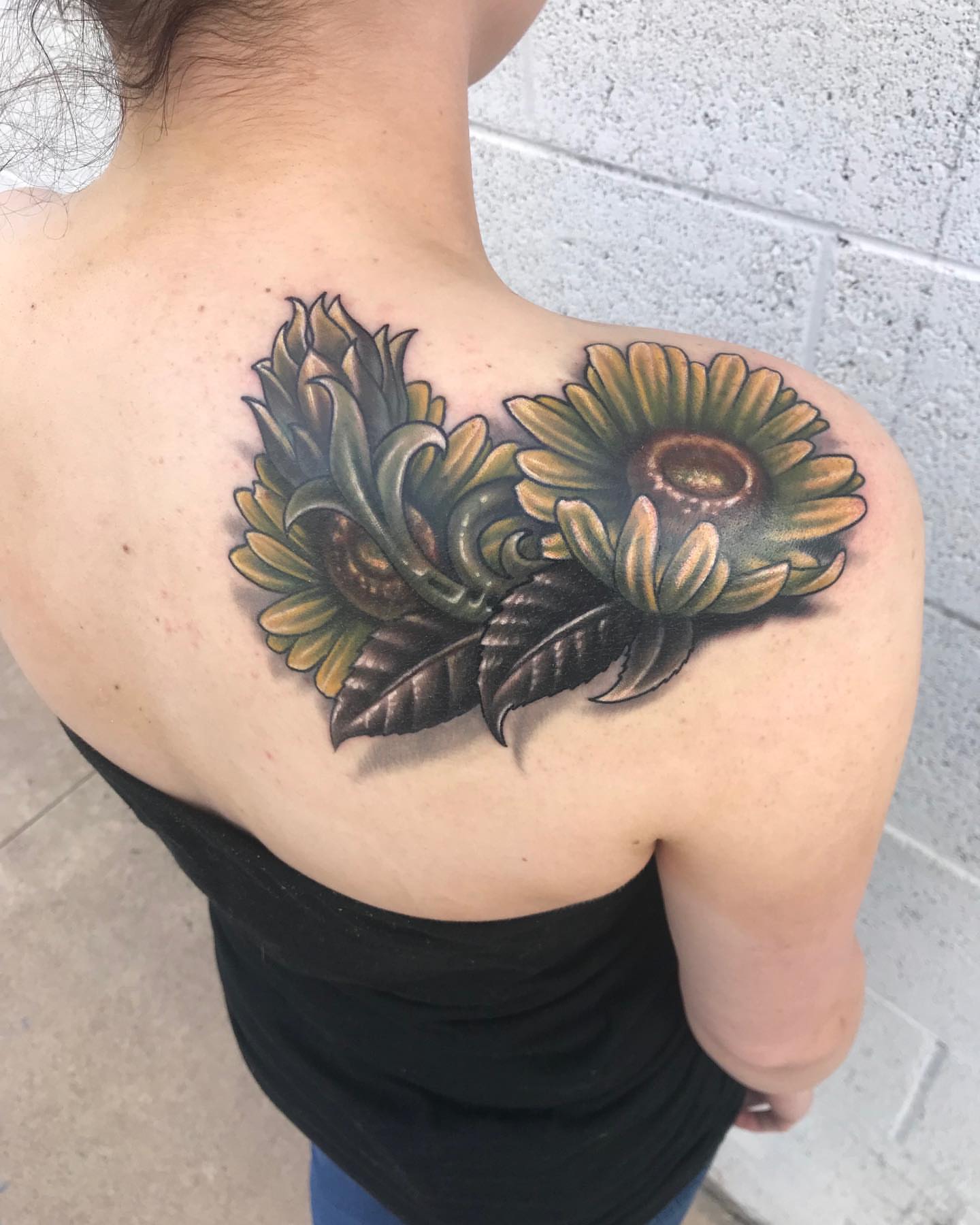 Sunflower realism tattoo on the shoulder by Ty McEwen Tattoo Artist │ Bioorganic │