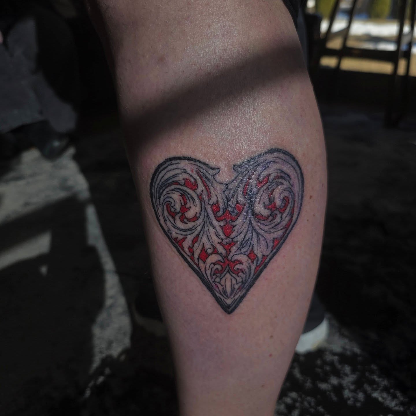 Heart ornamental tattoo on the thigh by julian