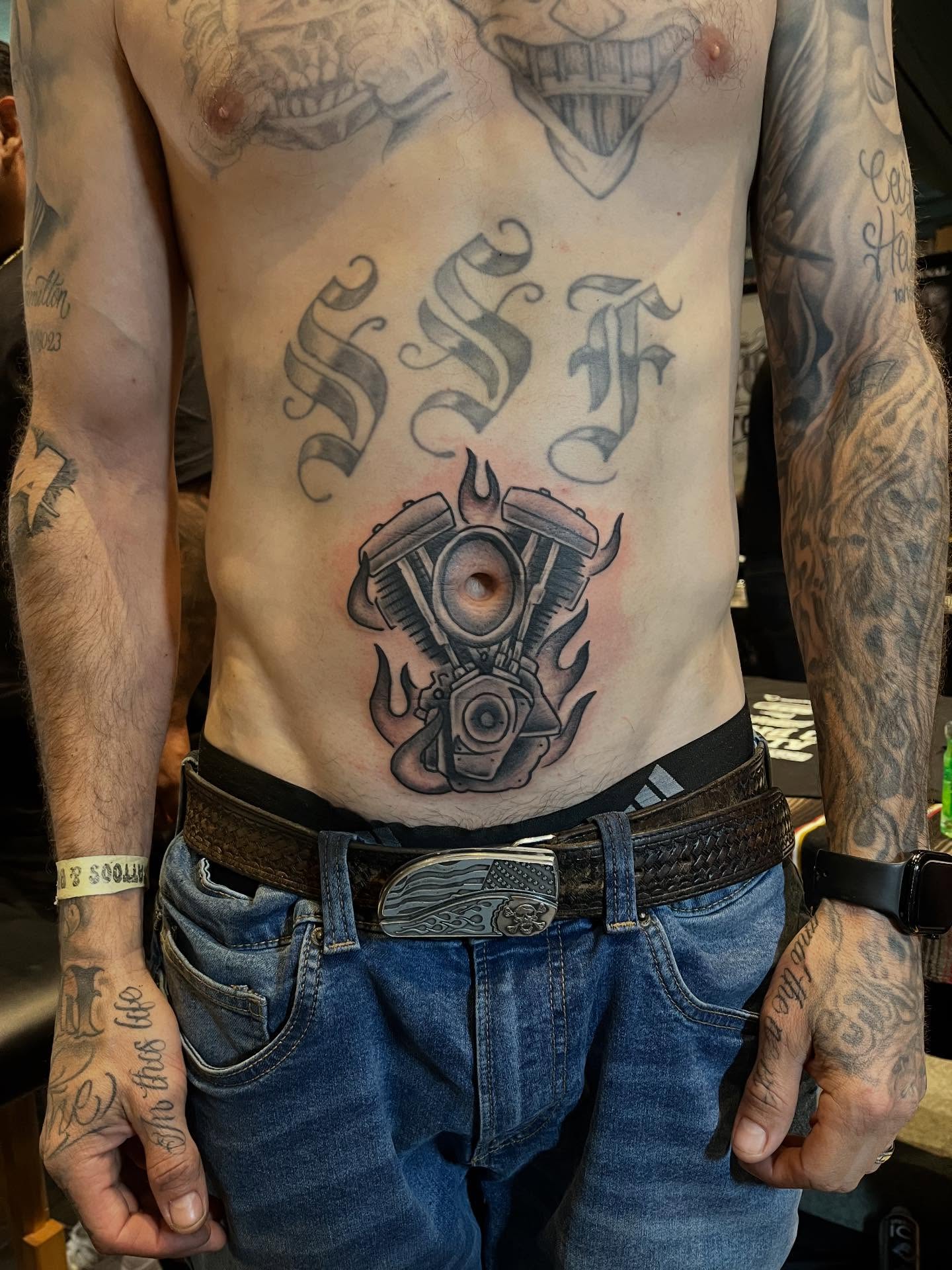 Motorcycle engine black and grey tattoo on the torso by Franky Sharpz