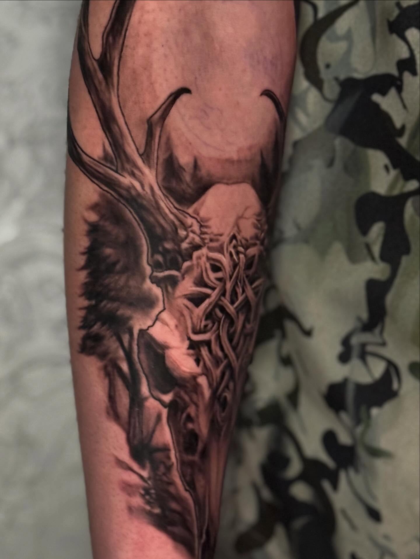 Deer skull realism tattoo on the forearm by Zoe "Z" Fisk