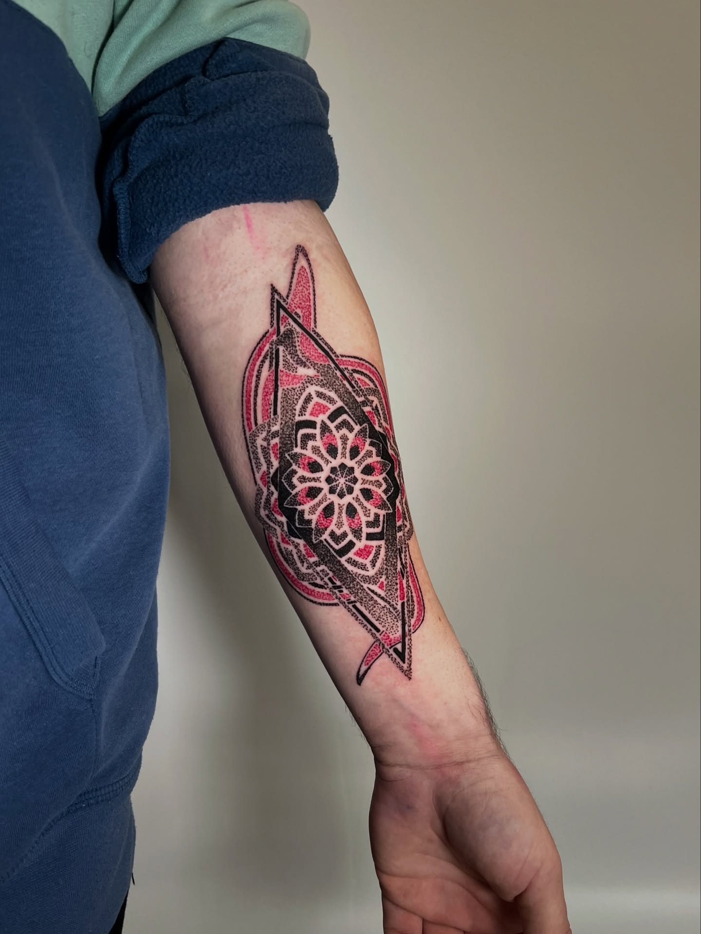 Mandala dotwork tattoo on the forearm by Riley