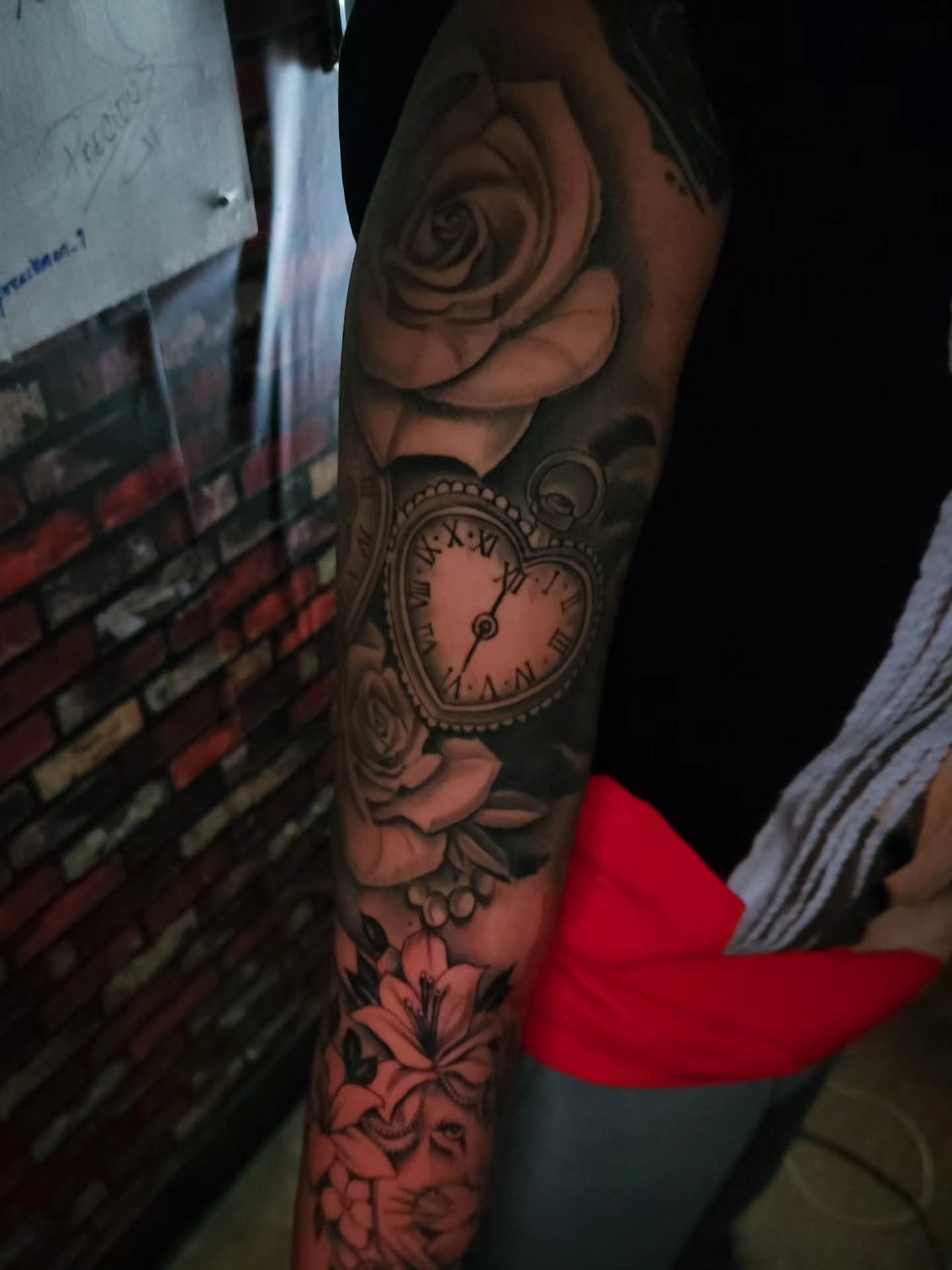 Clock and roses realism tattoo on the forearm by 🗣 No Minors🔞‼️‼️‼️