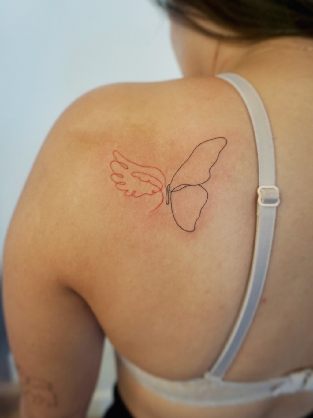 Tattoo by @yuri_tattooer — minimalist