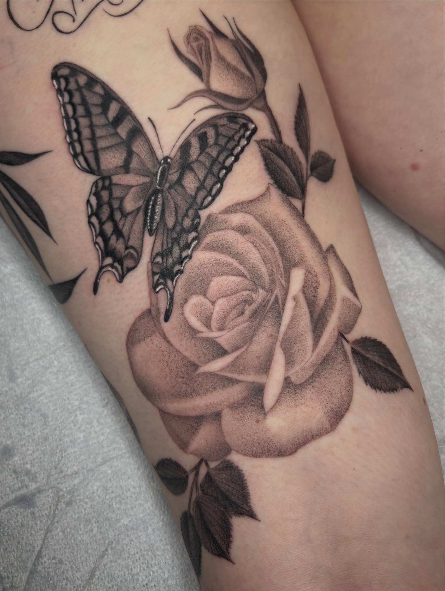 Butterfly and rose realism tattoo on the forearm by Miami Tattoo Artist π Mel Carrasco
