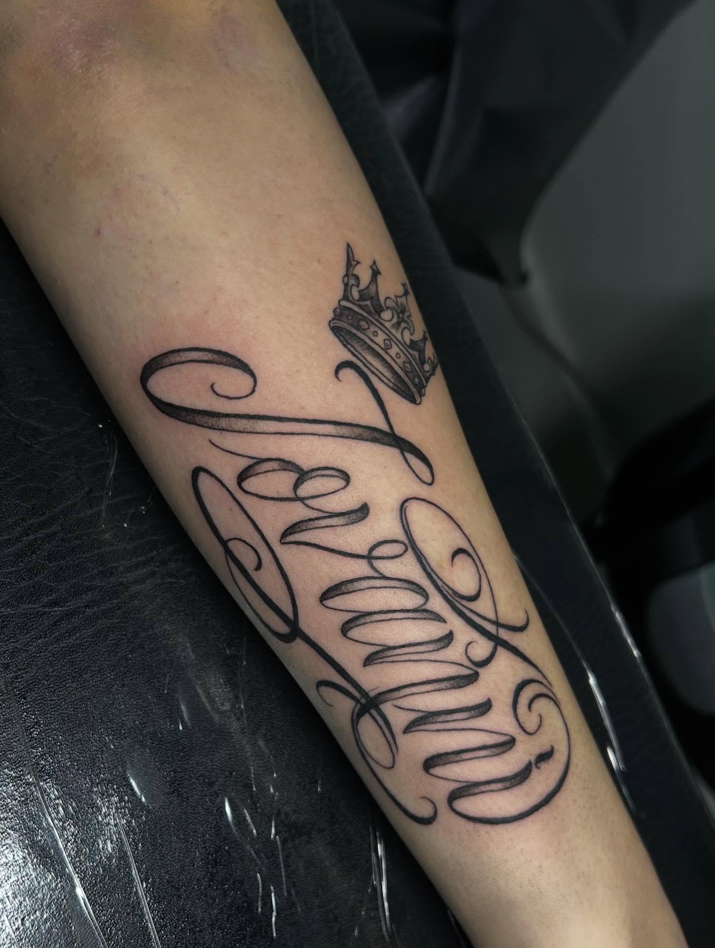Script lettering lettering script tattoo on the forearm by Ximena Favela