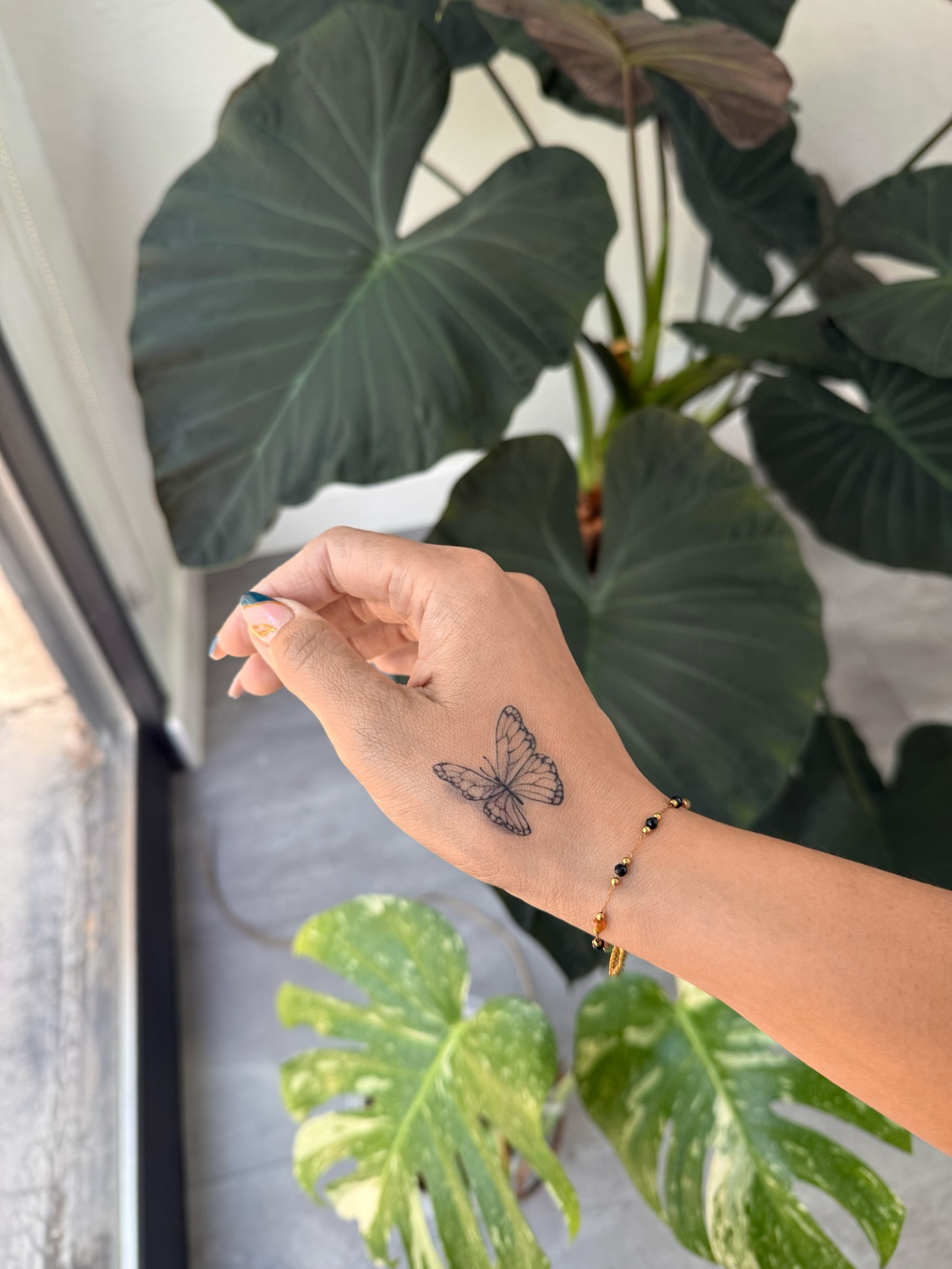 Tattoo by @pomaikai.artistry — black_and_grey