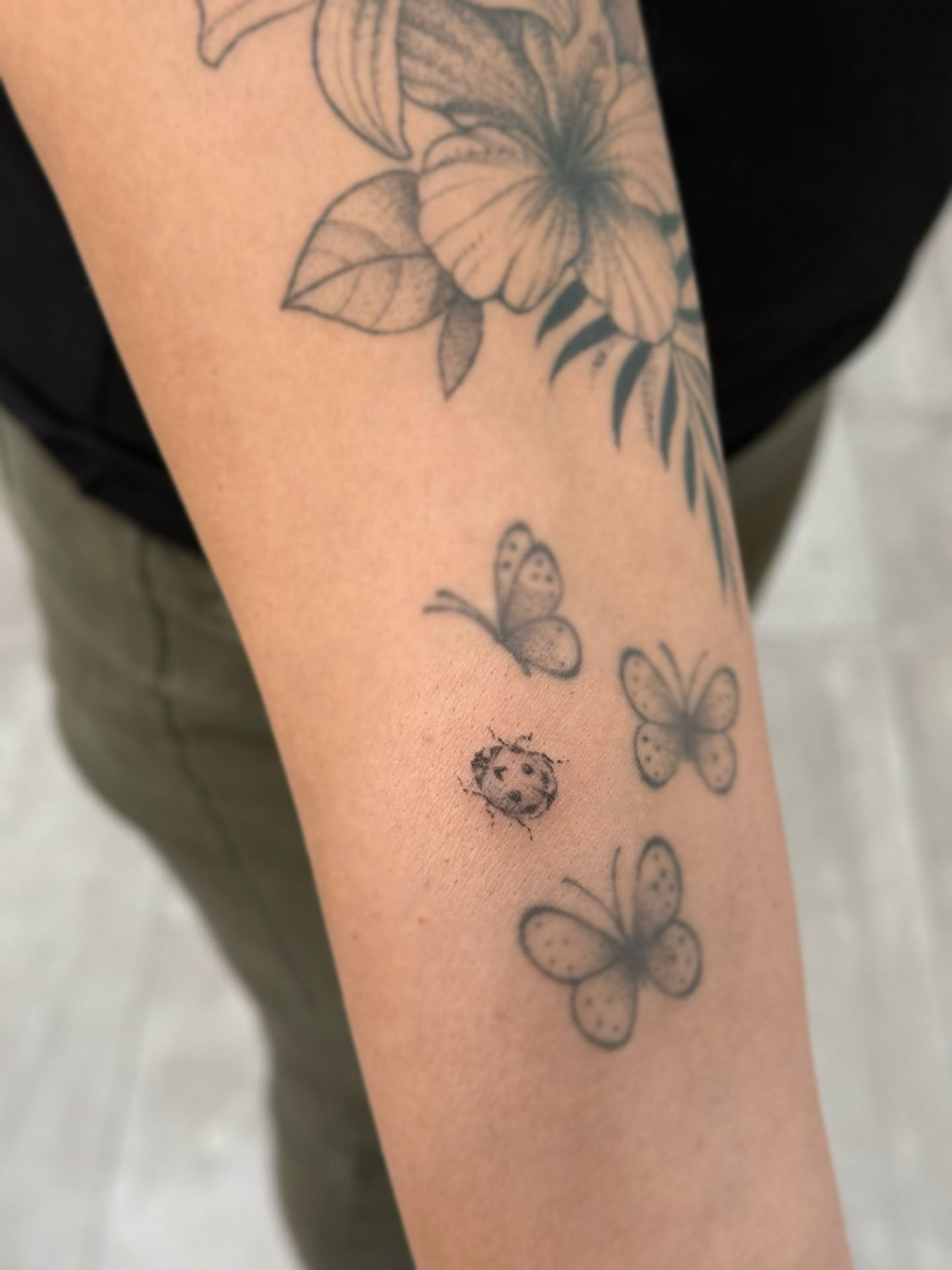 Tattoo by @pomaikai.artistry — black_and_grey