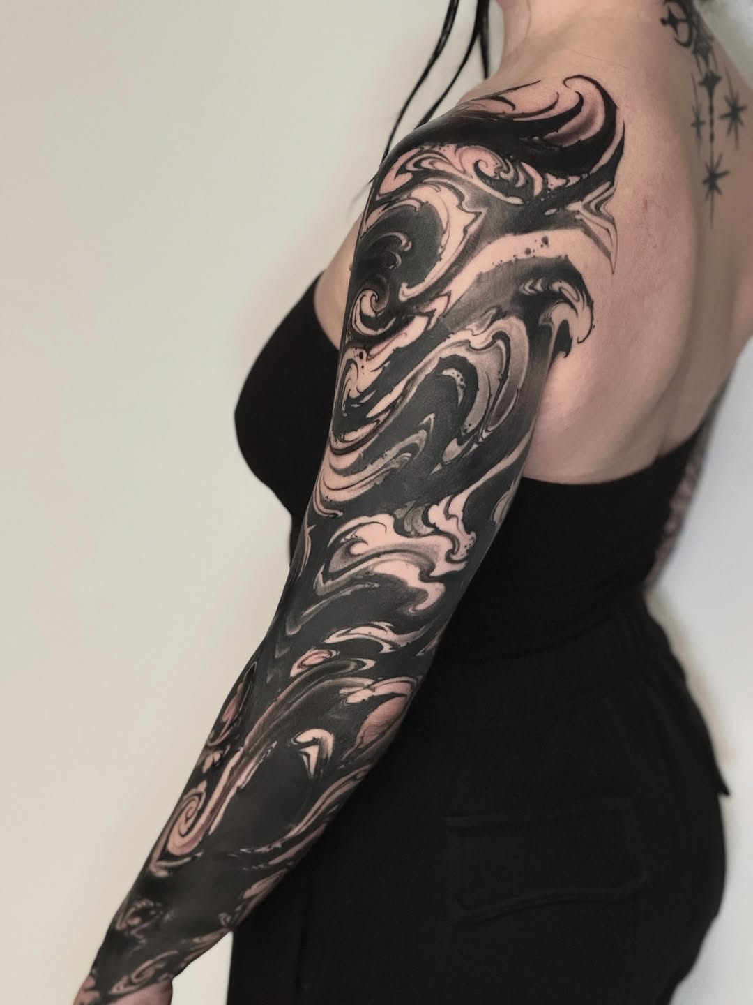 Tattoo by @abraxastattoo — blackwork, black_and_grey