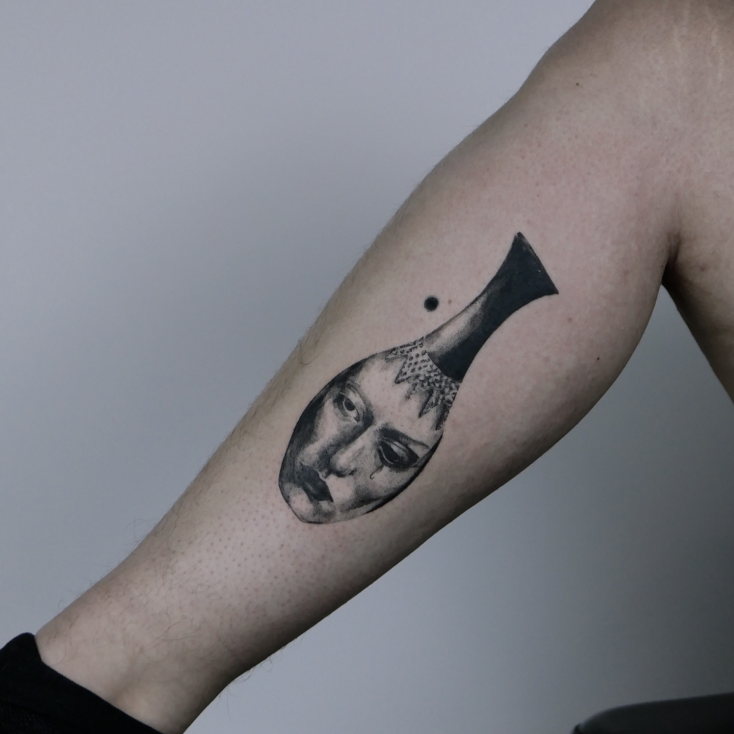 Woman's face dotwork tattoo on the forearm by Mané, Portland, Oregon