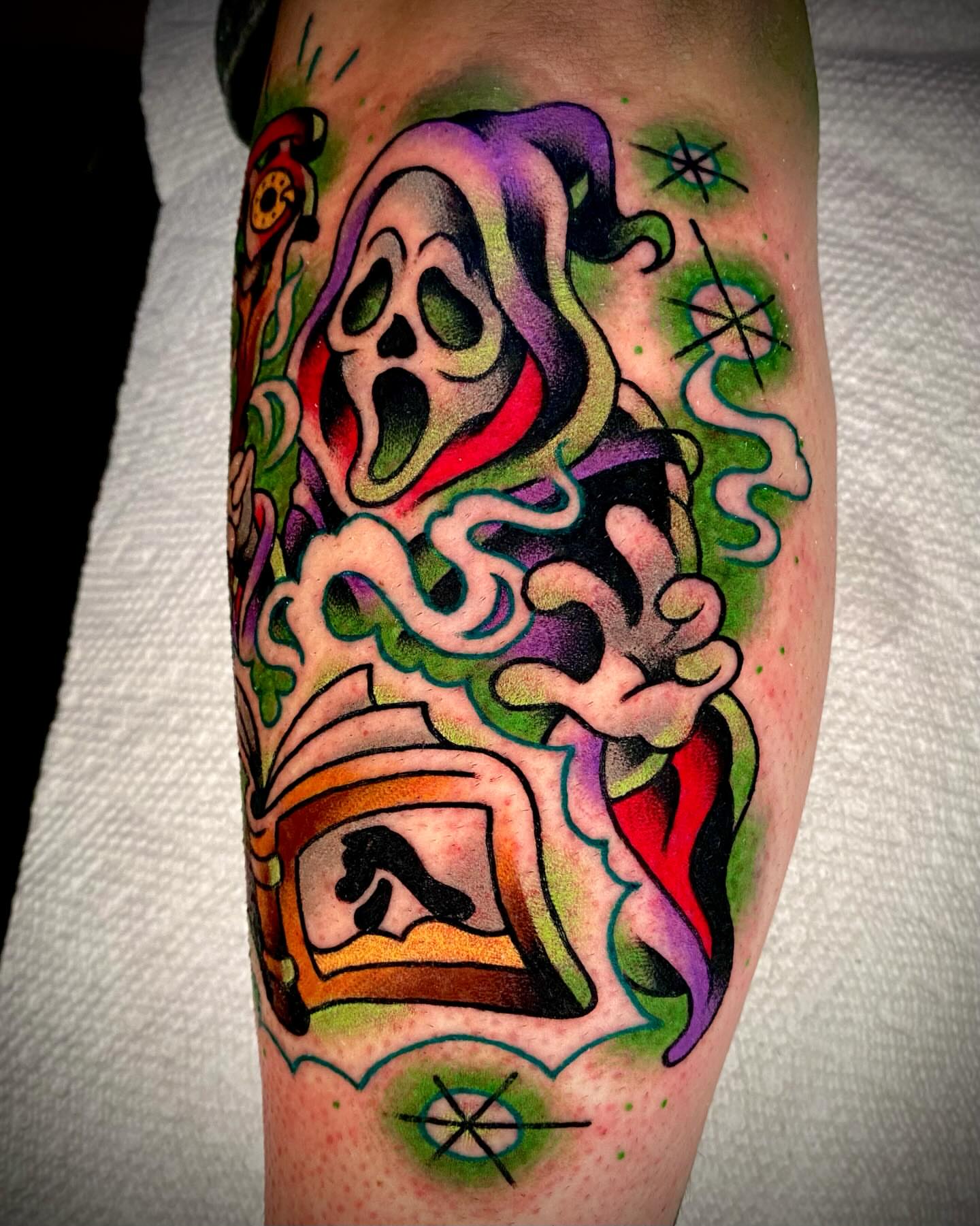 Ghostly figure American traditional tattoo on the forearm by Zach Knisley (Wiz)