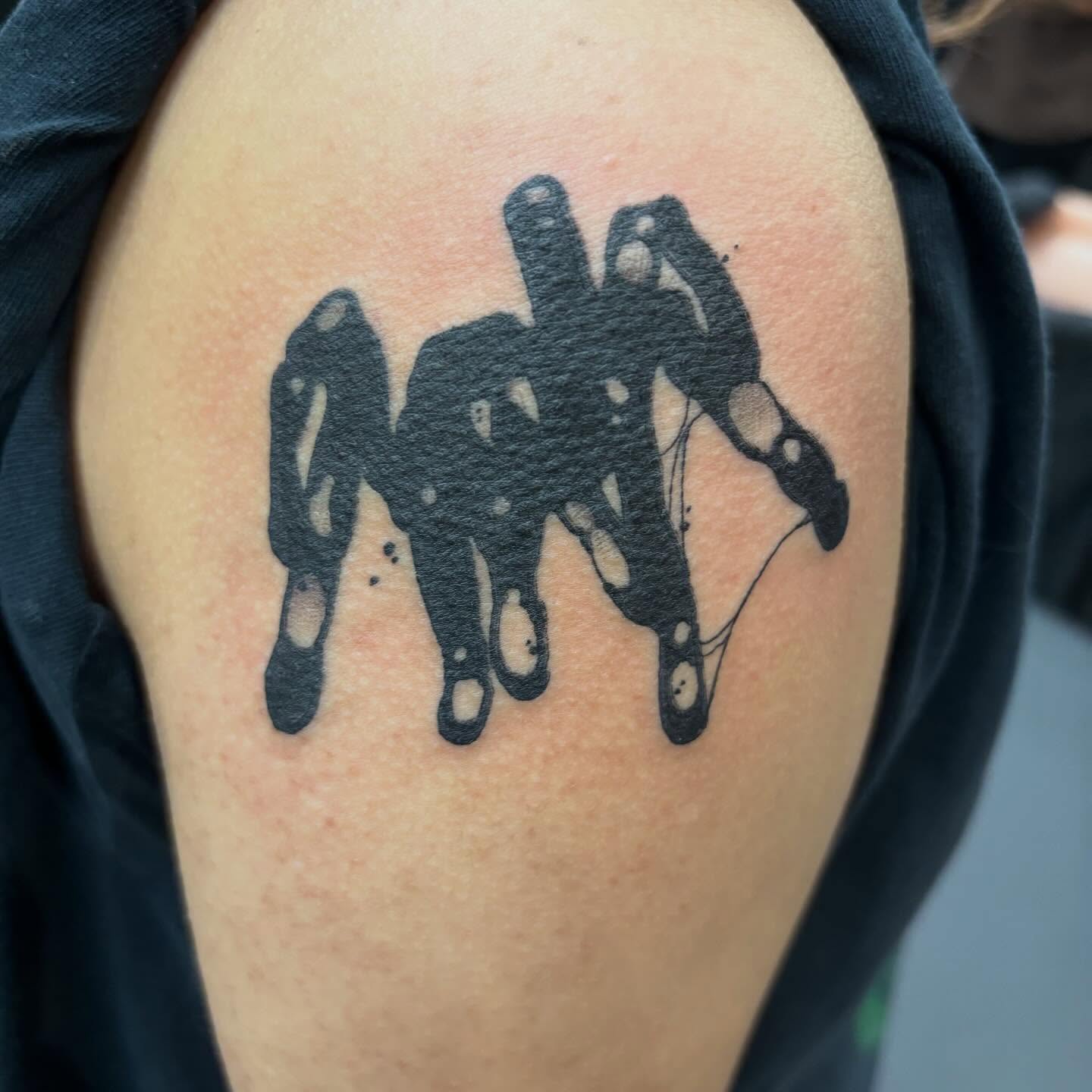 Abstract shape dotwork tattoo on the shoulder by Ghost Ham Tattoos