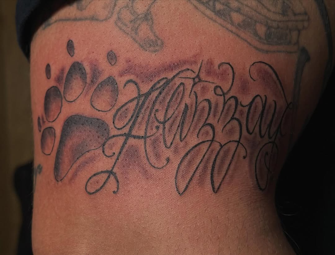Tattoo by @tatts_ruru — lettering_script, black_and_grey