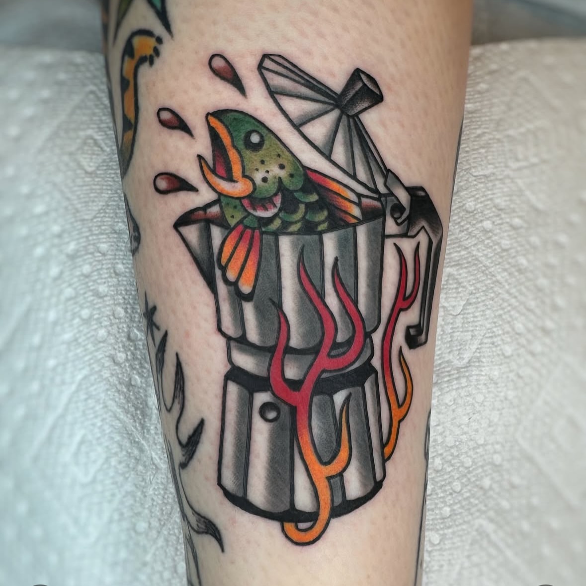 Fish in pot American traditional tattoo on the forearm by Cori James Tattoo Artist