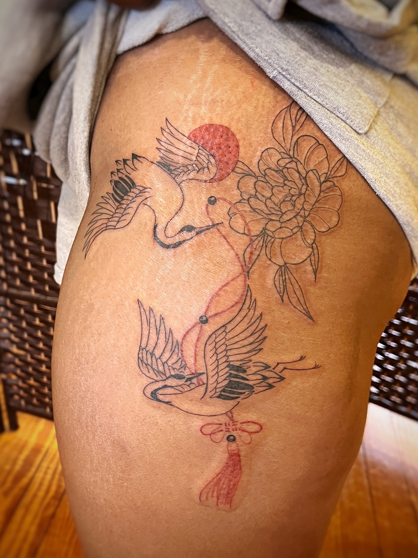 Cranes and flowers japanese irezumi tattoo on the thigh by Risa Cincinnati Tattoo Artist