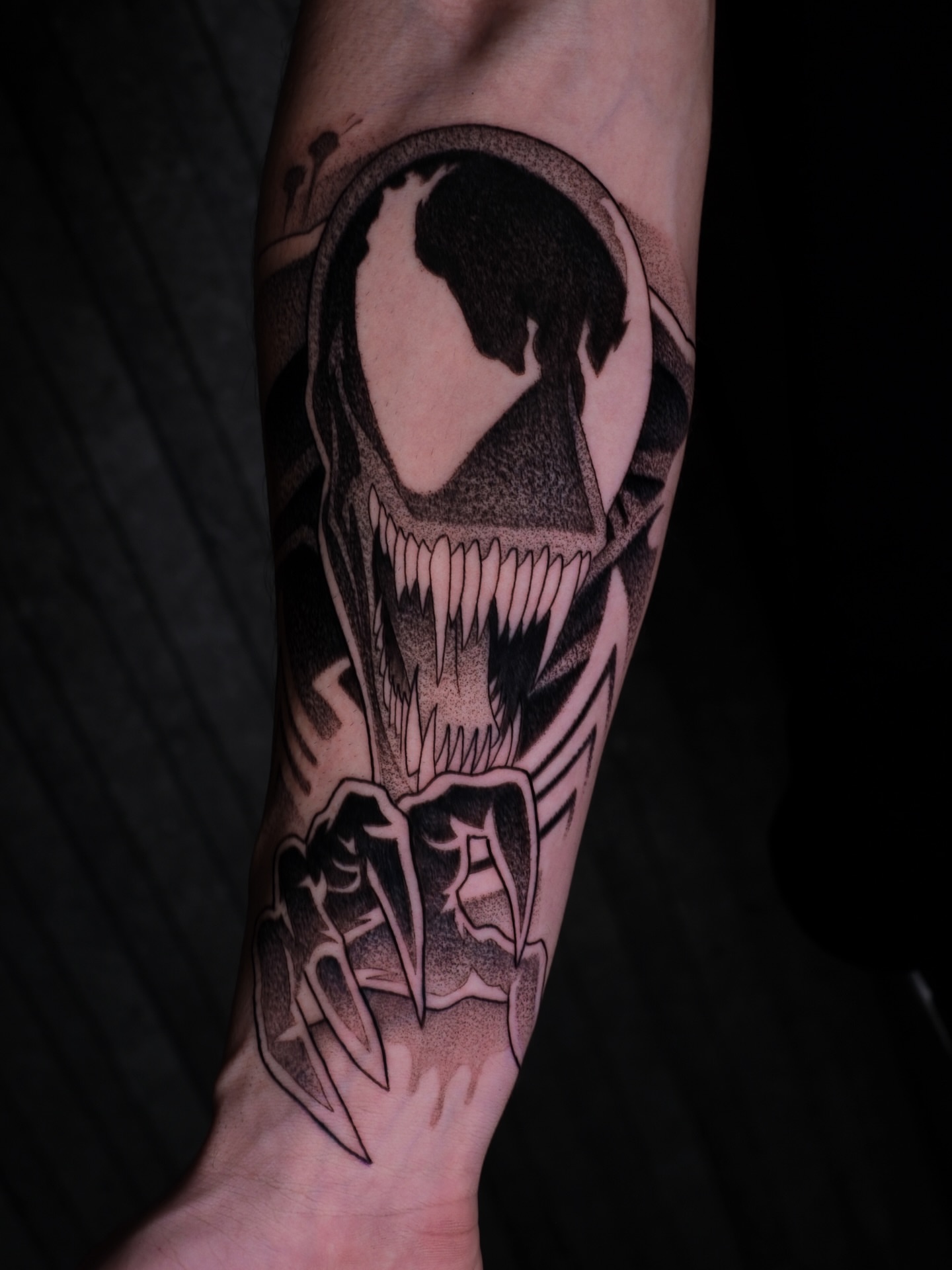 Venom dotwork tattoo on the forearm by Yakir, Houston, Texas