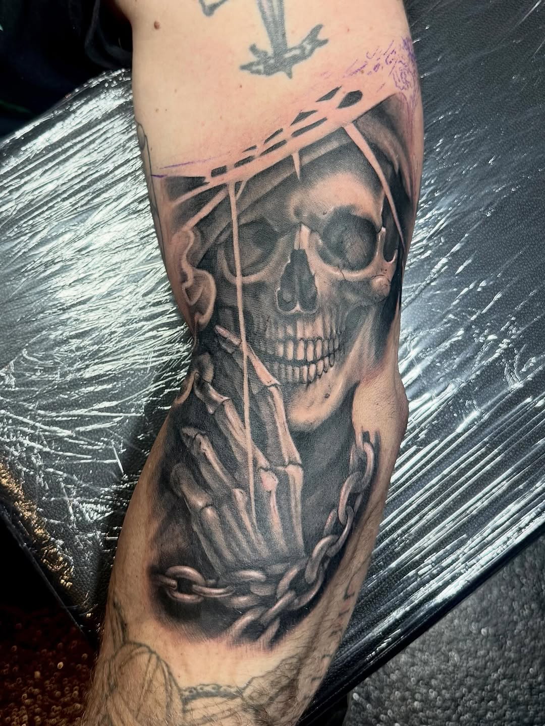 Tattoo by @leftycolbert_official — realism, black_and_grey