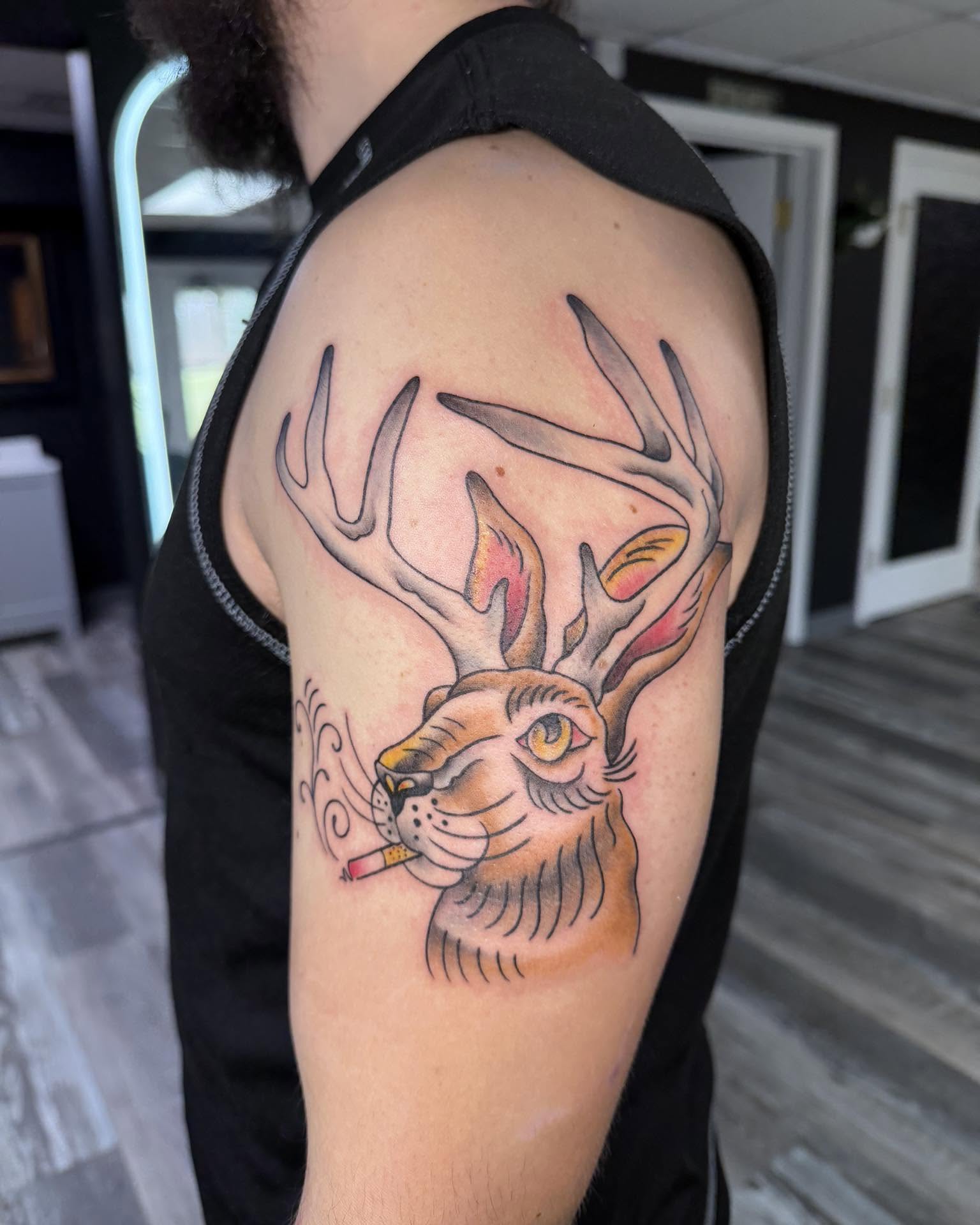 Deer smoking cigarette American traditional tattoo on the shoulder by ✶ teryn ✶, Akron, Ohio