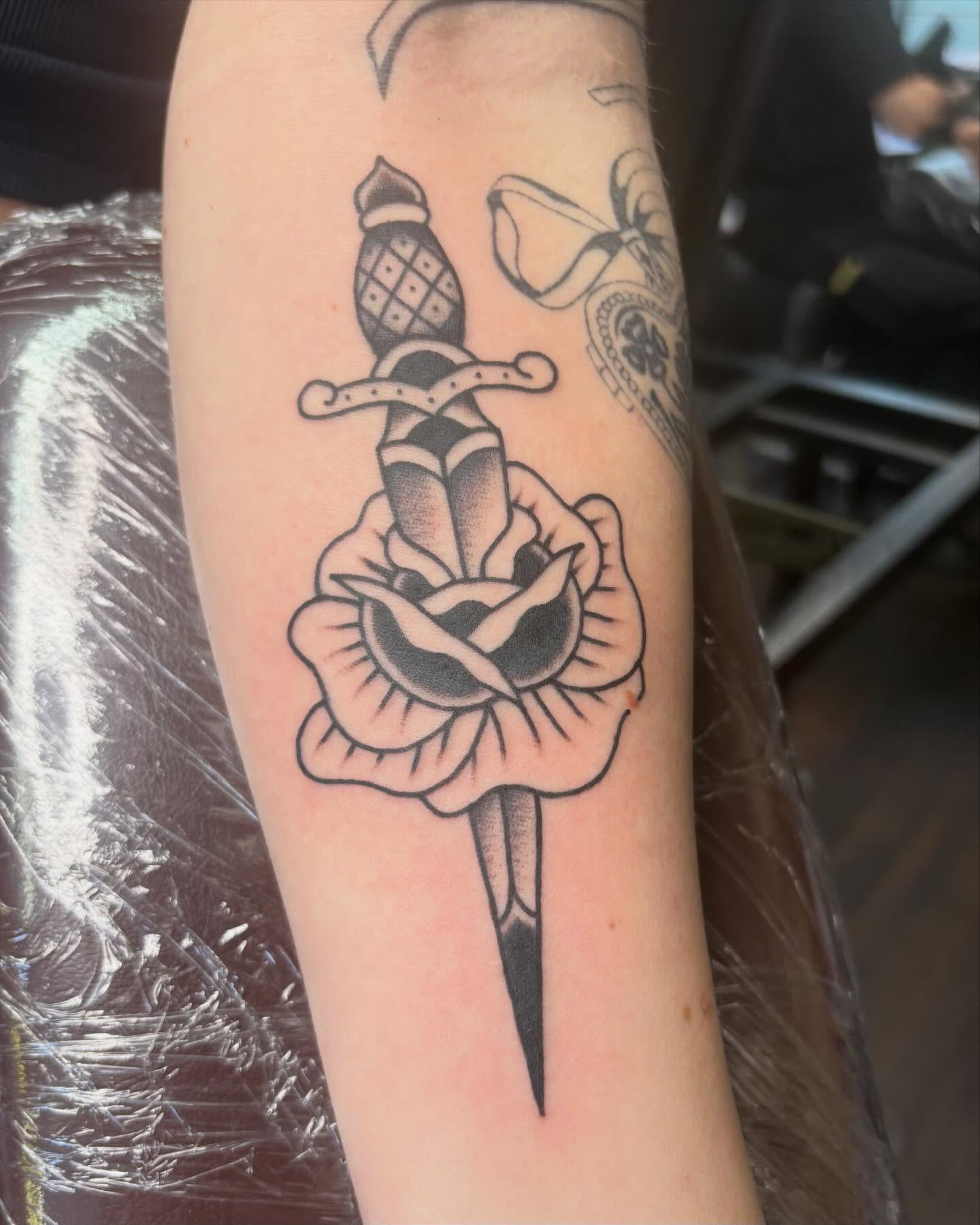 Sword through rose black and grey tattoo on the forearm by ✨Shelby ✨