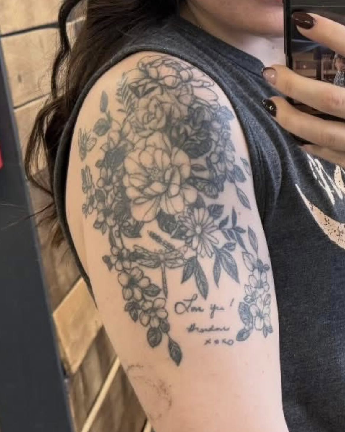 Floral bouquet black and grey tattoo on the shoulder by Chelsea Nichole