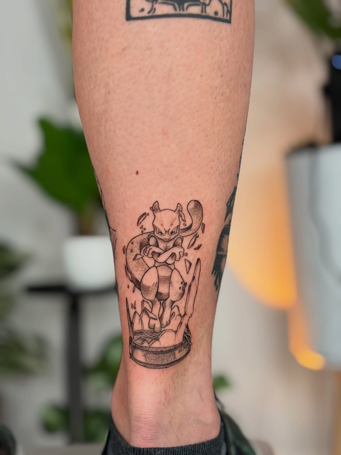 Mewtwo black and grey tattoo on the forearm by Quinn ᶻ 𝗓 𐰁 .ᐟ, Charlotte, North Carolina