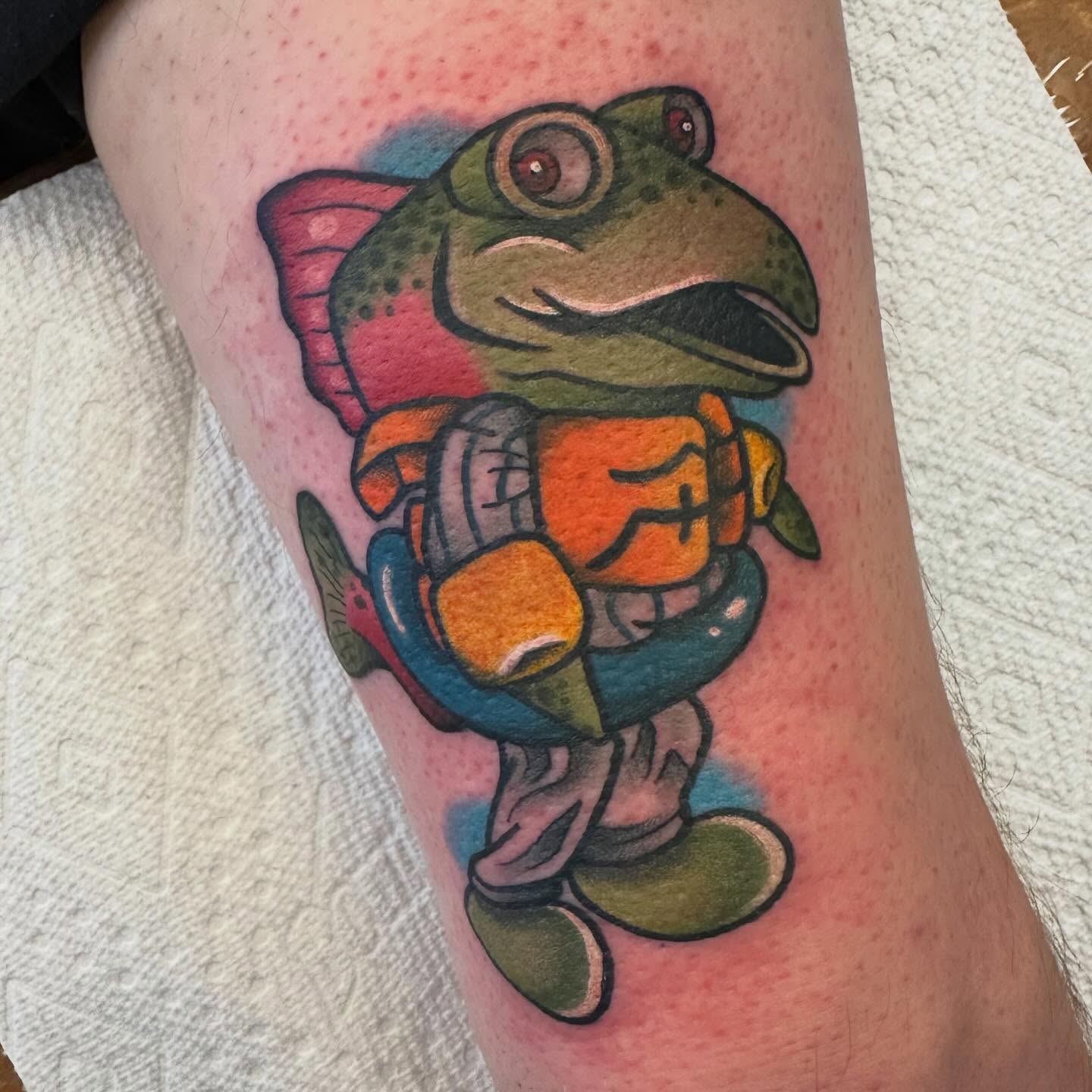 Frog character American traditional tattoo on the forearm by Katie Beth