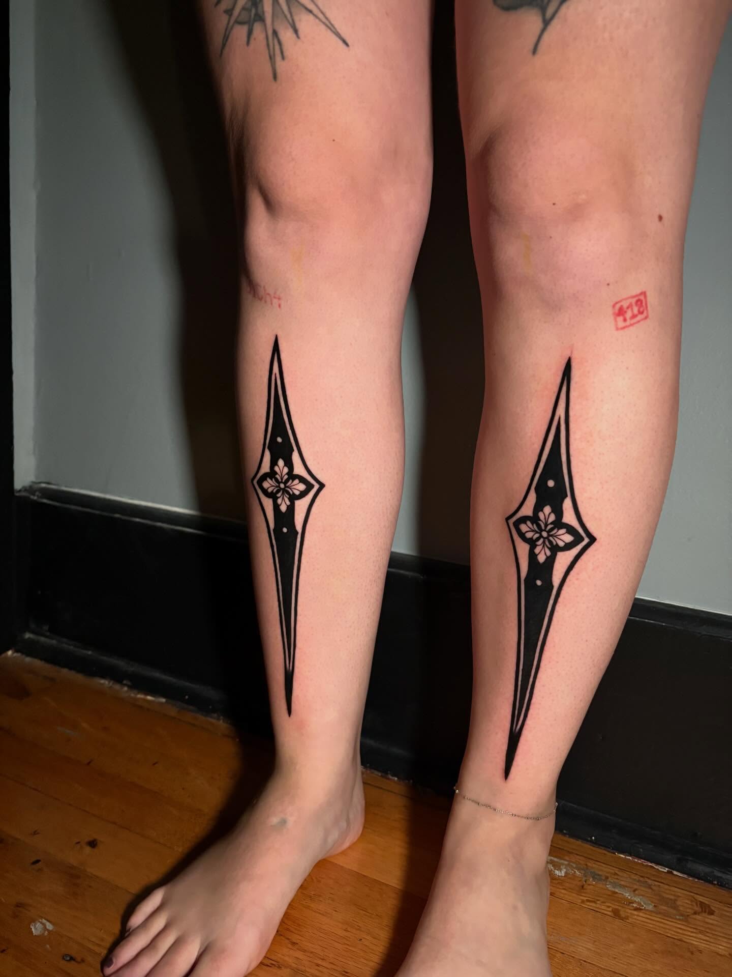 Geometric diamond geometric tattoo on the calf by Cameron Scofield