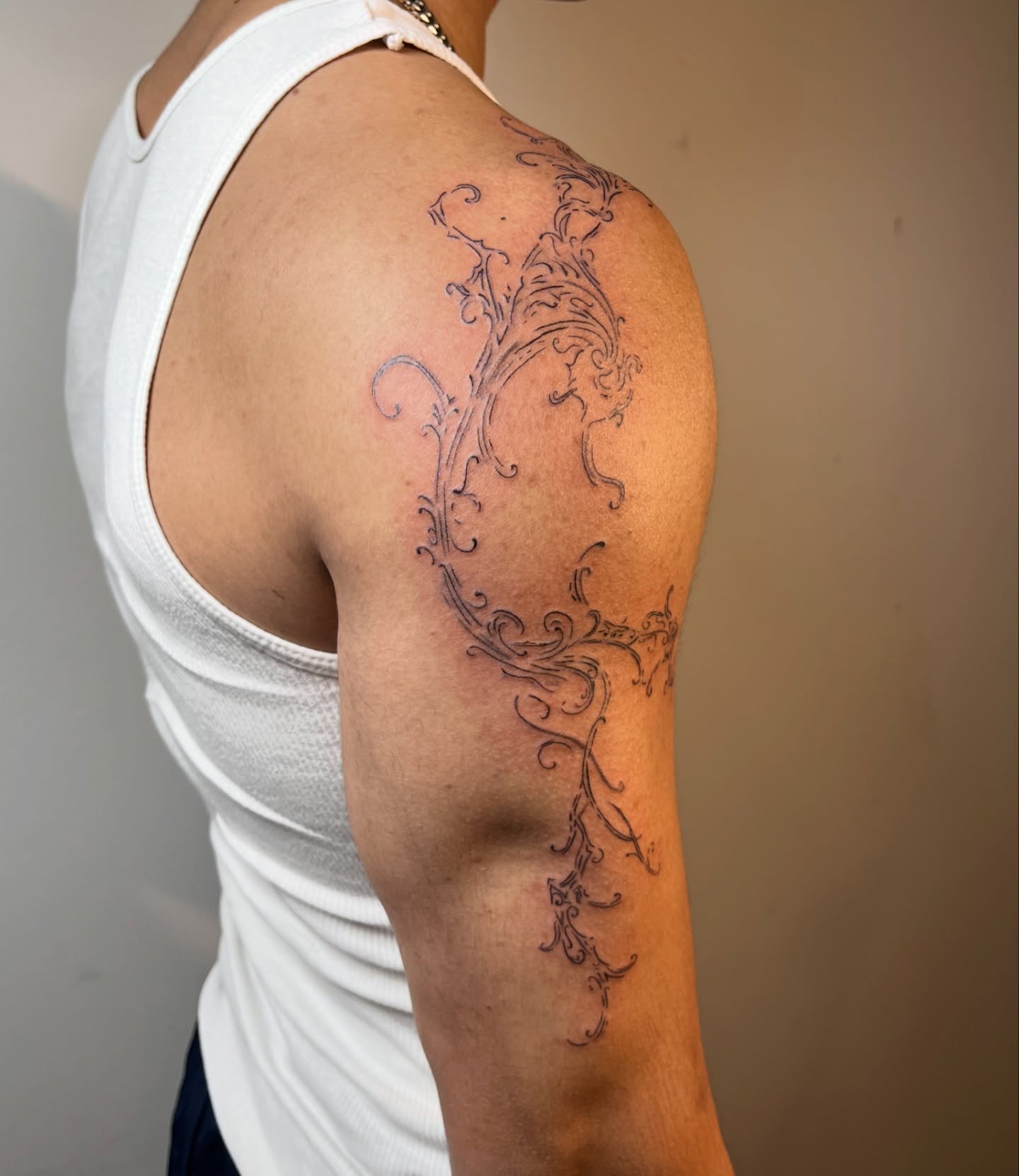 Scrollwork ornamental tattoo on the shoulder by brinley - fine line tattoos, Crescent Springs, Kentucky
