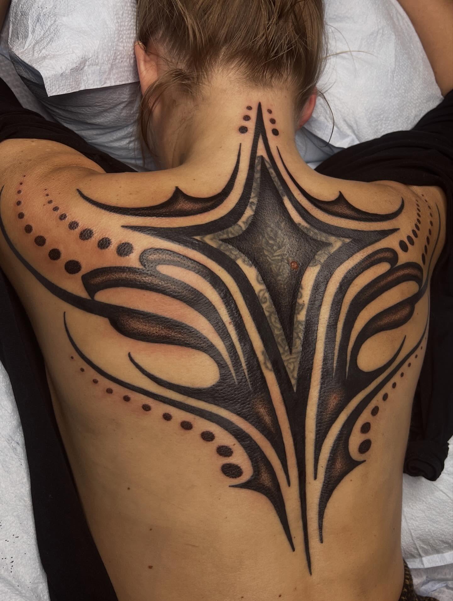 Tribal design tribal tattoo on the back by 👽 Kat 👽, San Francisco, California
