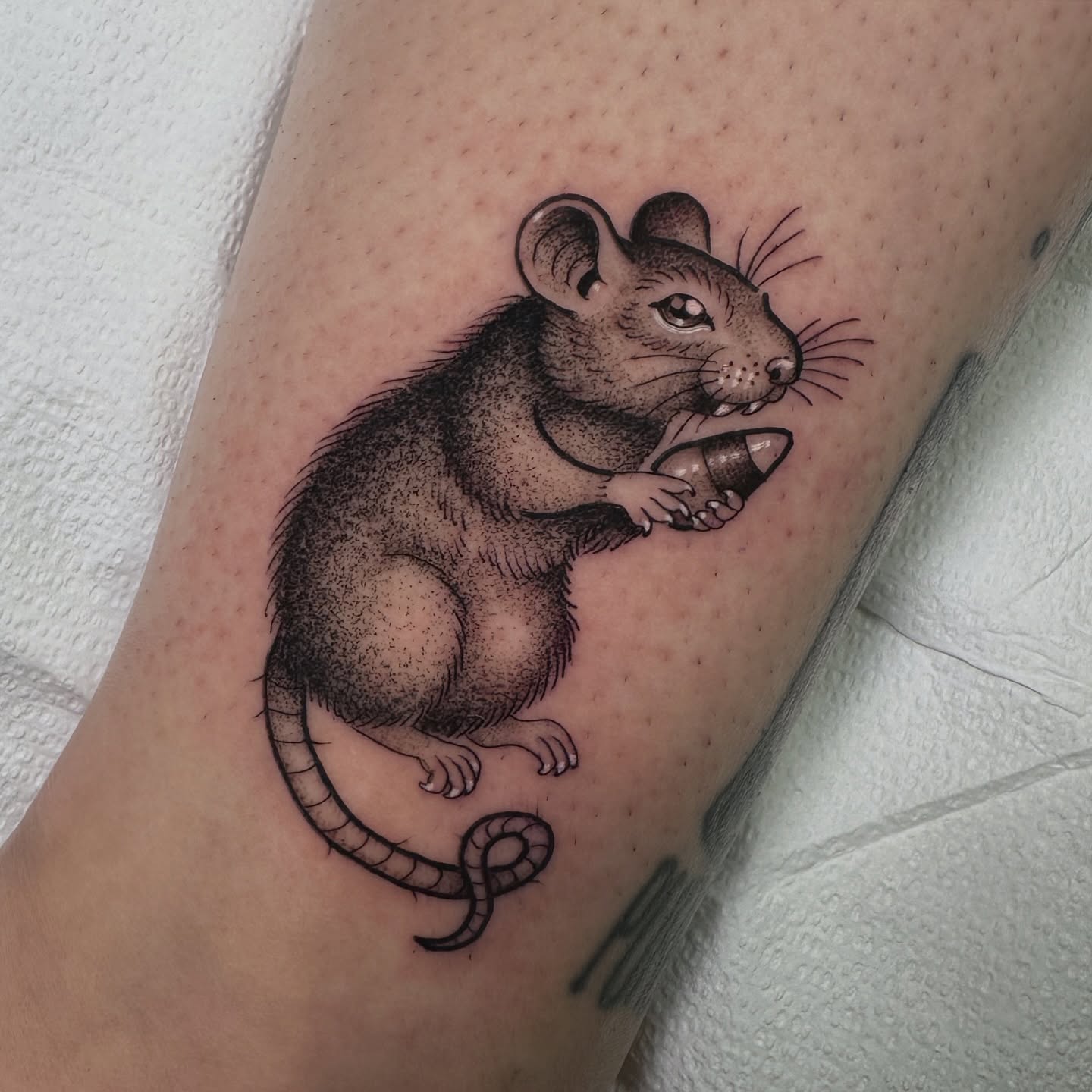 Rat dotwork tattoo on the forearm by Patrick Whiting