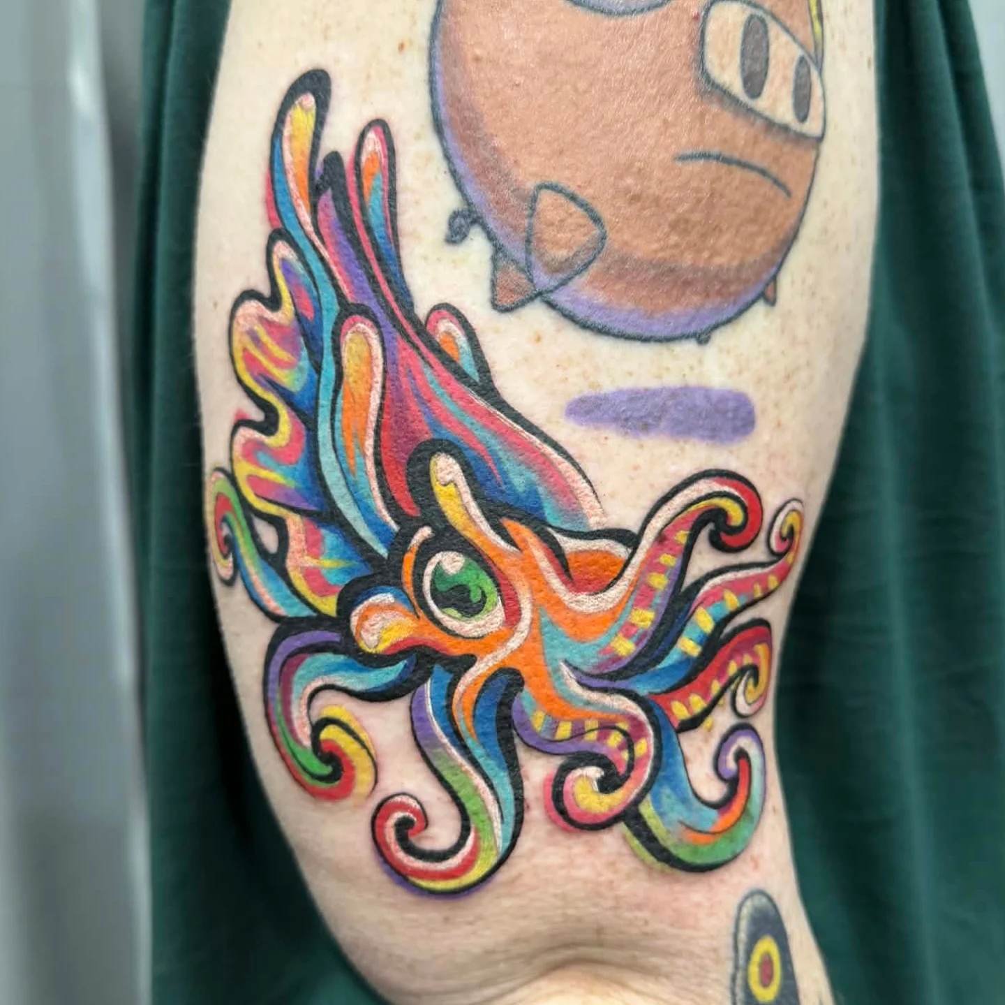 Octopus new school tattoo on the forearm by Devon Greig