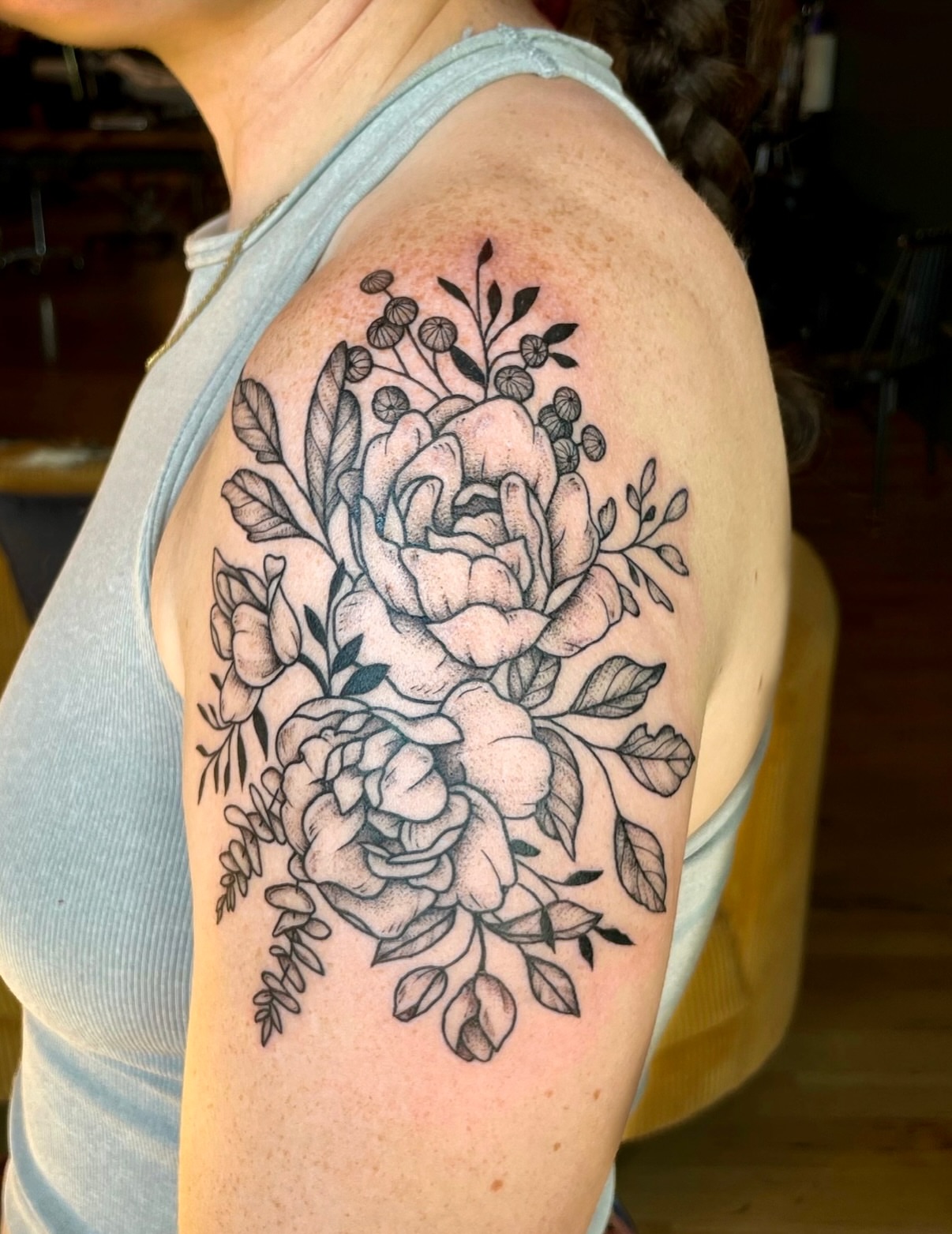Floral bouquet black and grey tattoo on the shoulder by Hannah, Portland, Oregon