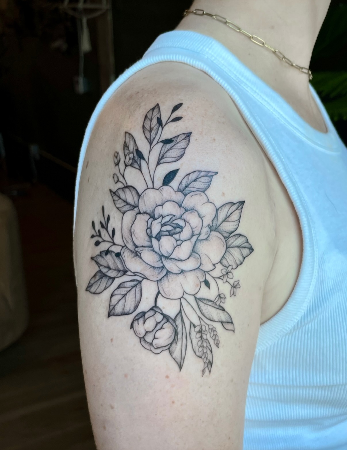 Floral bouquet black and grey tattoo on the shoulder by Hannah, Portland, Oregon