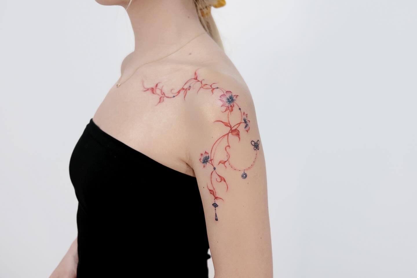 Floral vine fine line tattoo on the shoulder by 애박 ⋆⁺₊ ₊⁺⋆ Aebak