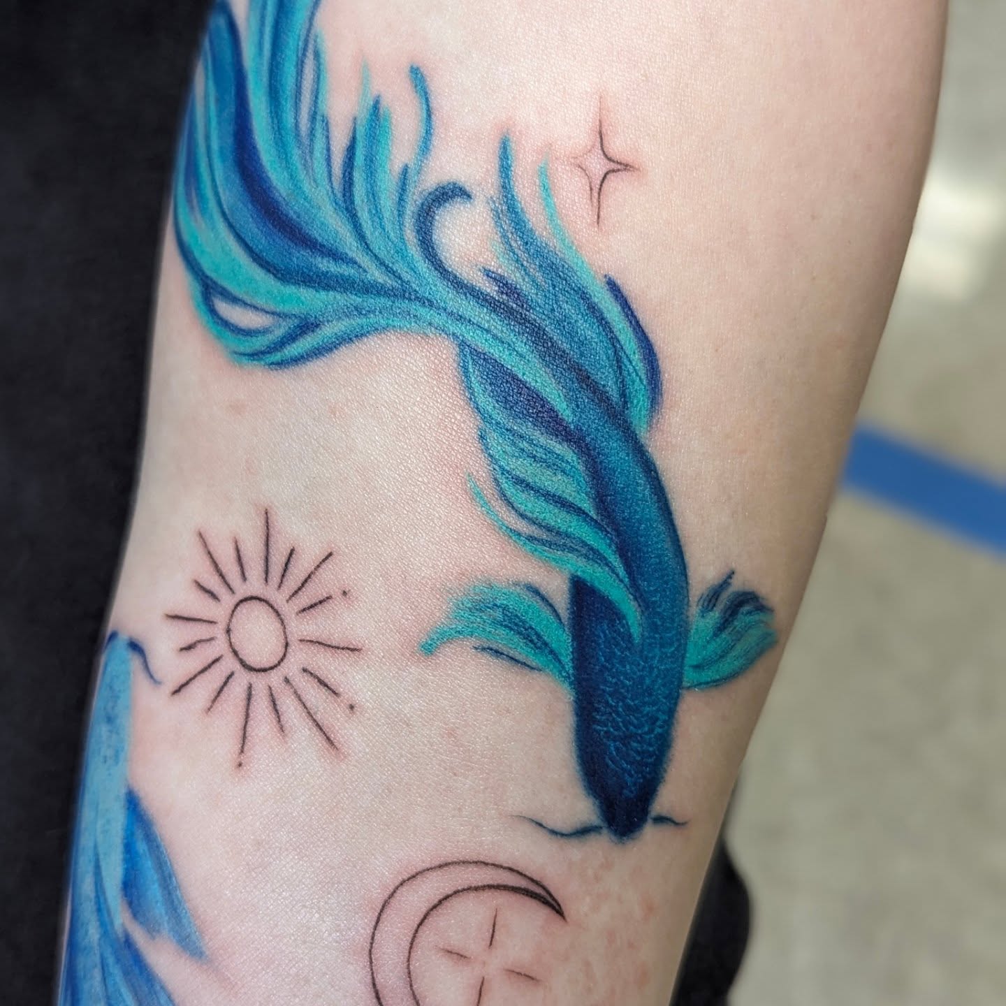 Mermaid tail new school tattoo on the forearm by Jou Smile (Jo)