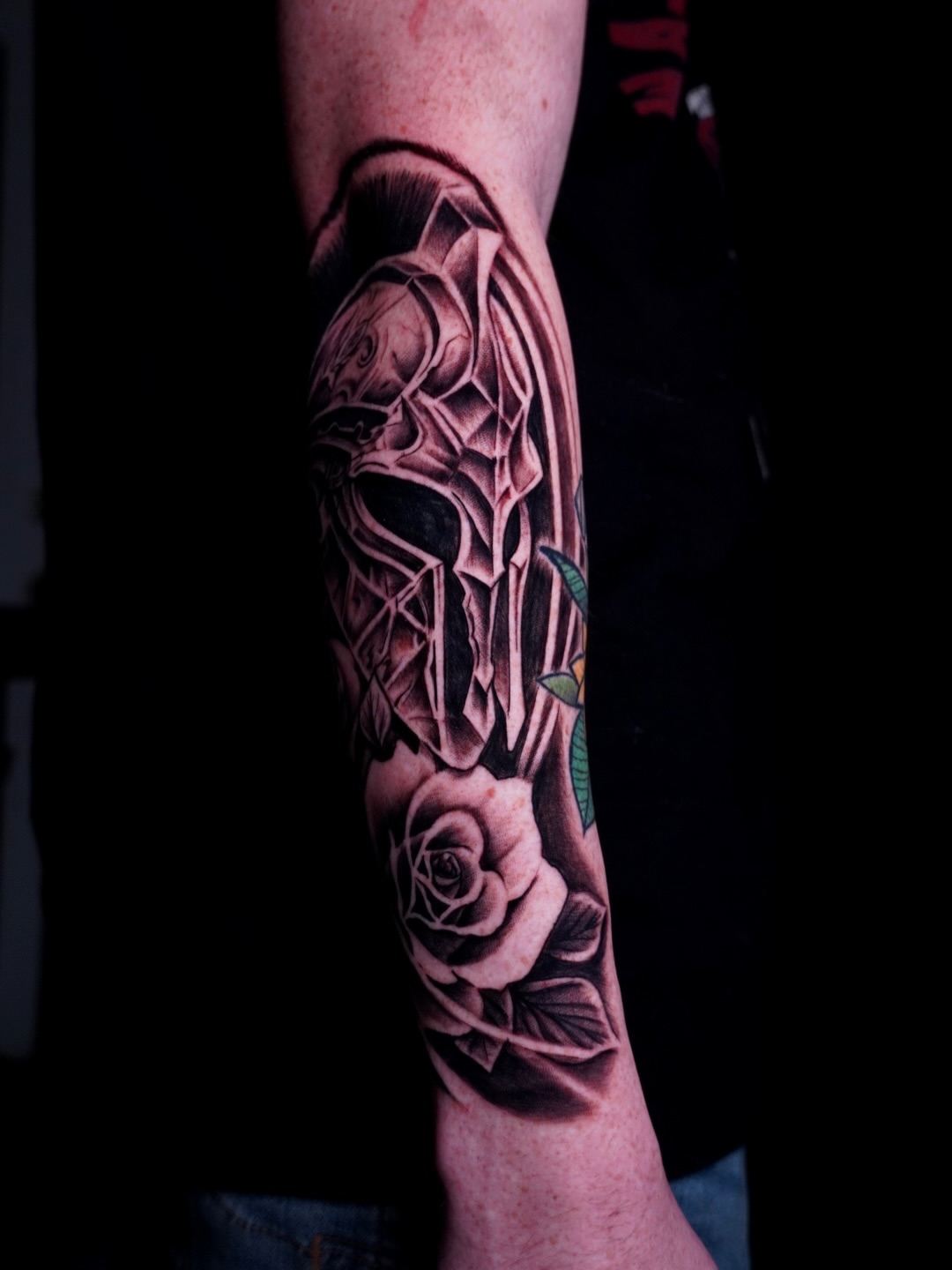 Geometric skull with roses geometric tattoo on the forearm by Greg Petrali
