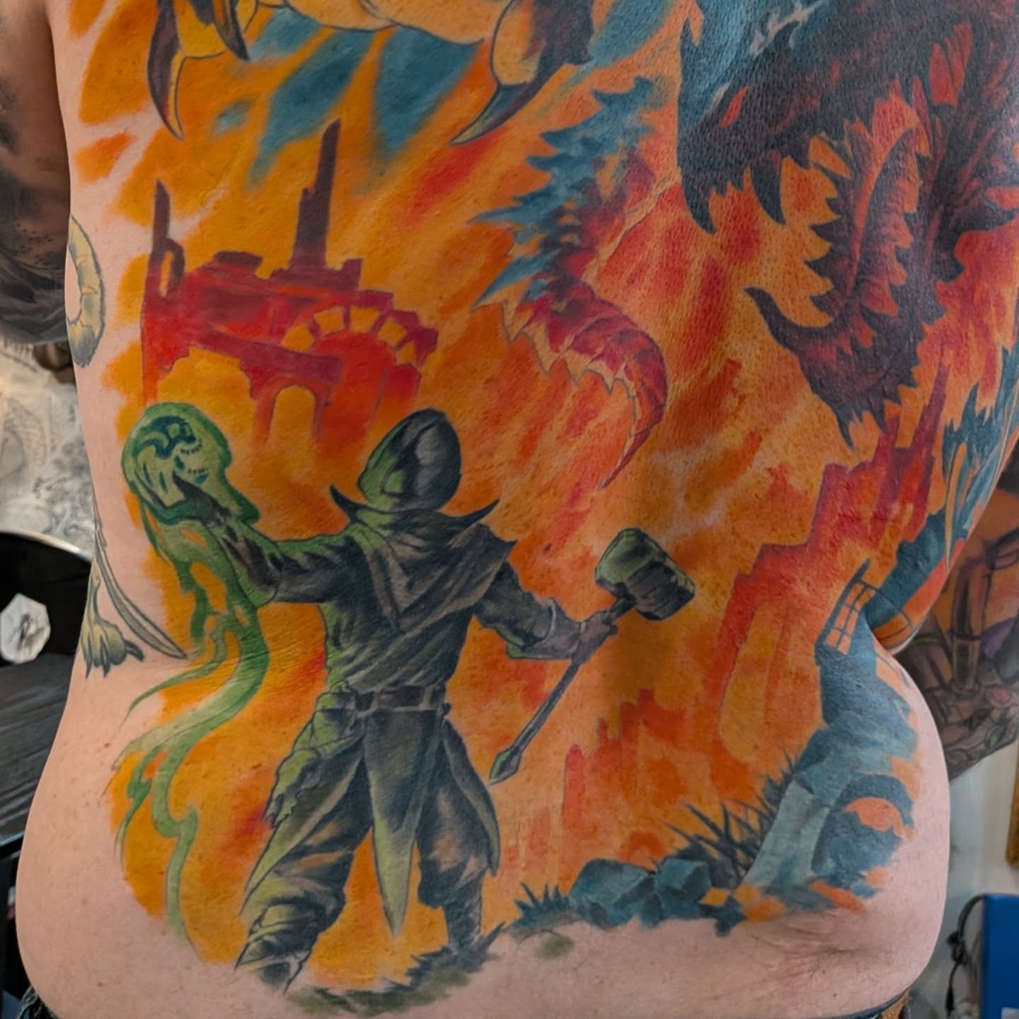 Demon warrior watercolor tattoo on the thigh by Nic Skrade, Minneapolis, Minnesota