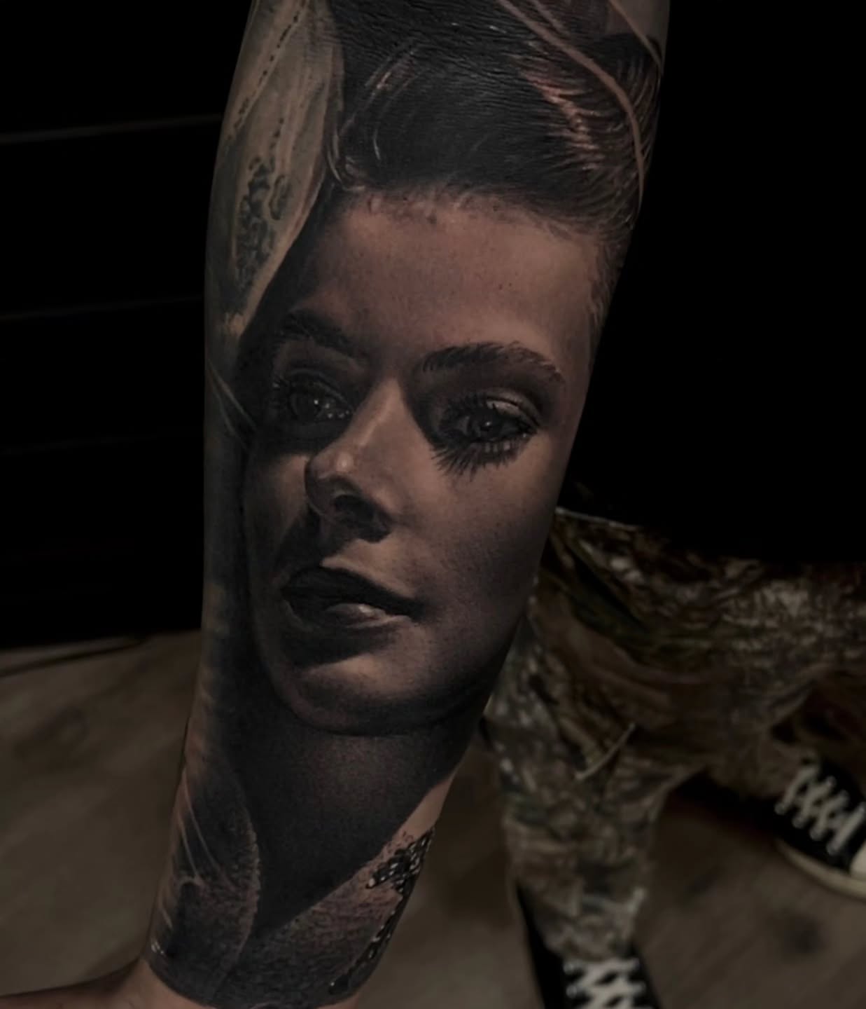 Portrait realism tattoo on the forearm by Owen Paulls