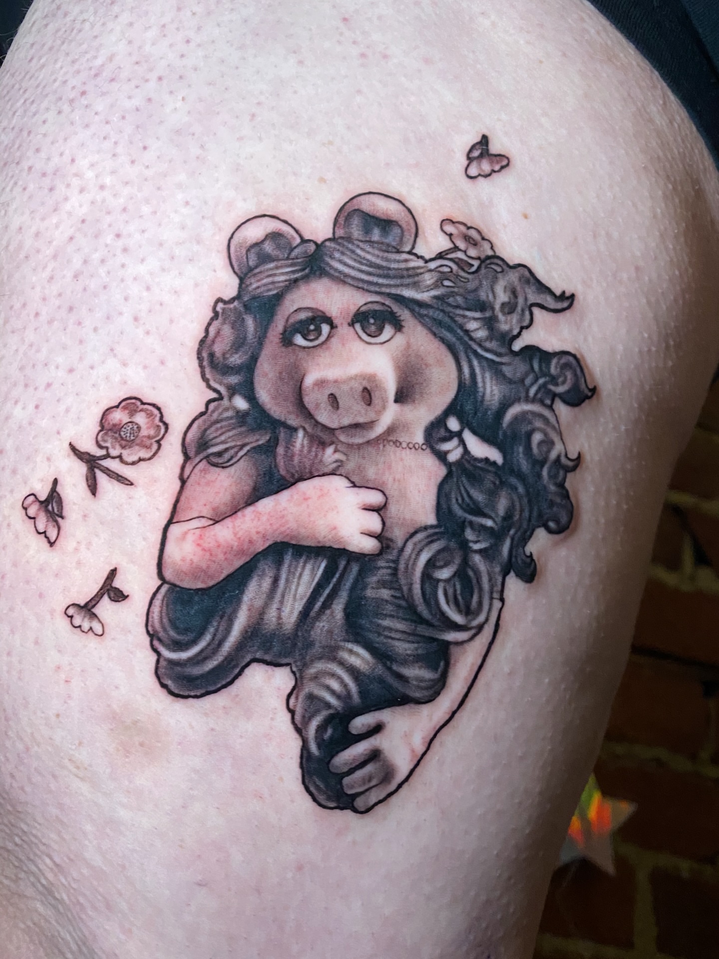 Miss piggy black and grey tattoo on the shoulder by Francis Hagendorn, Toronto, Ontario