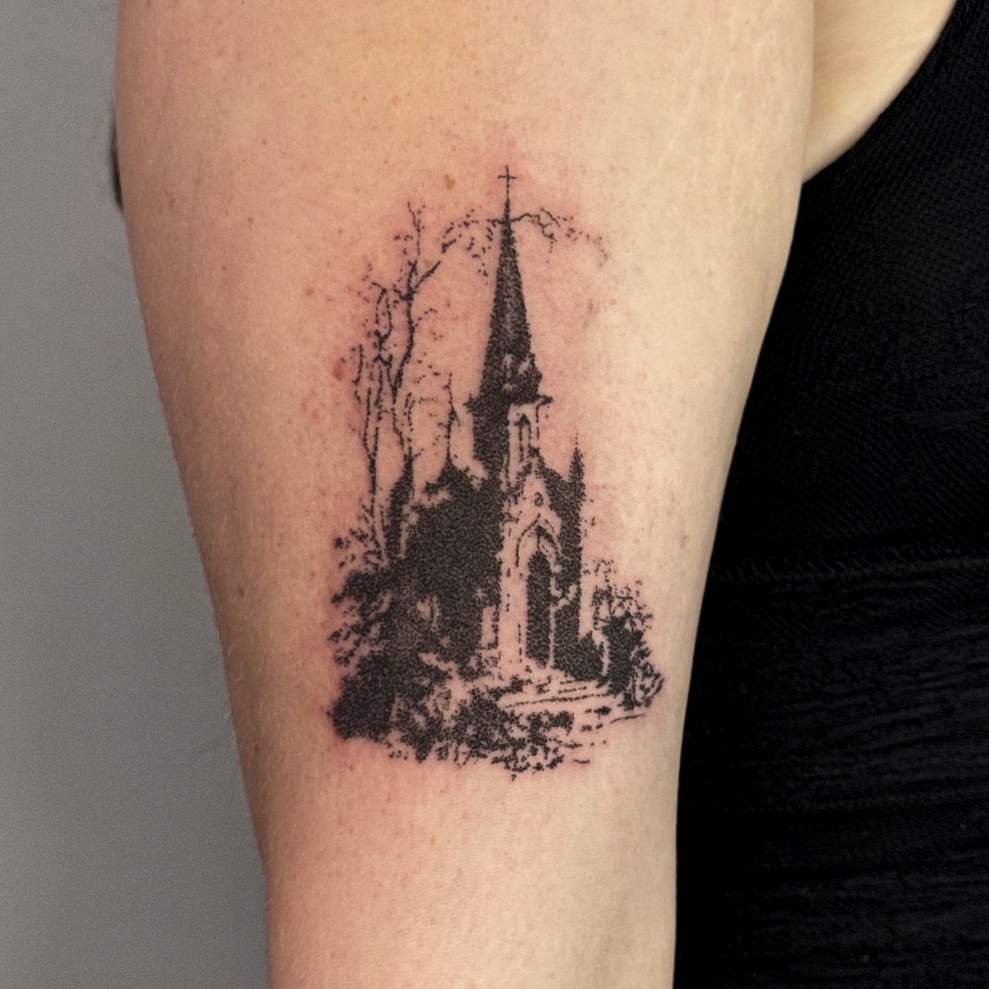 Church black and grey tattoo on the forearm by Joint Killer
