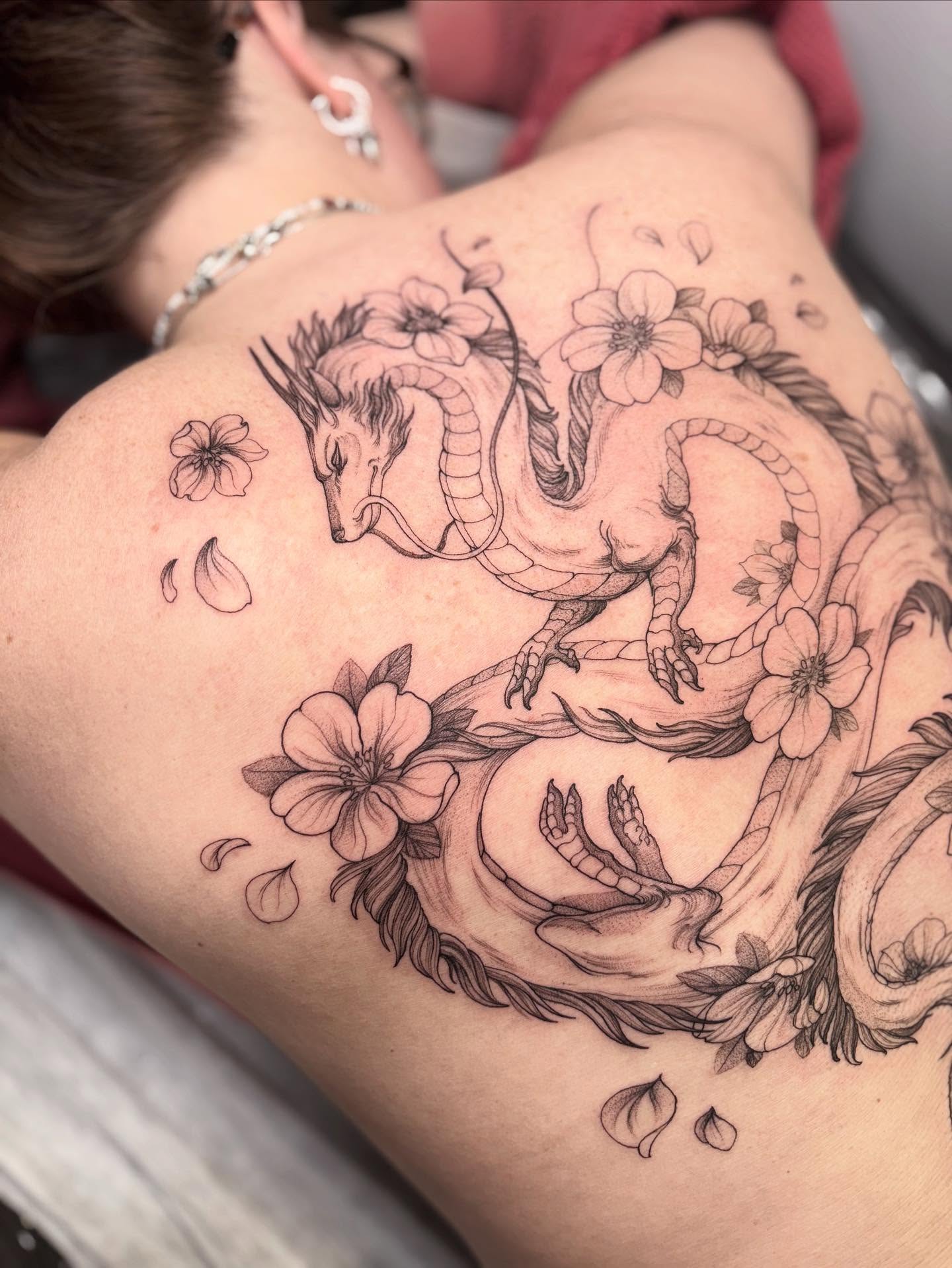 Dragon and flowers realism tattoo on the back by vaprol tattoo ✧ Boston