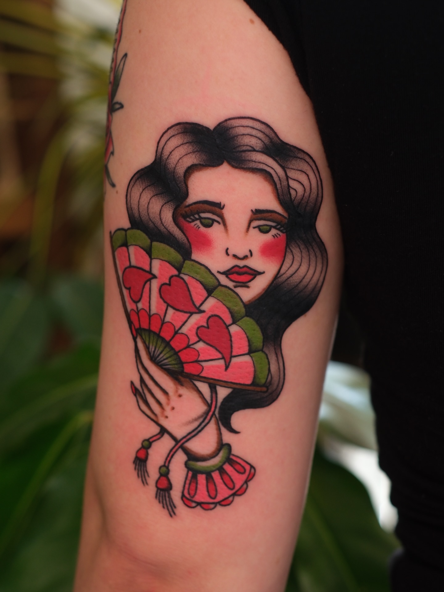 Woman with fan American traditional tattoo on the forearm by Mallory Murphy, Denton, Texas