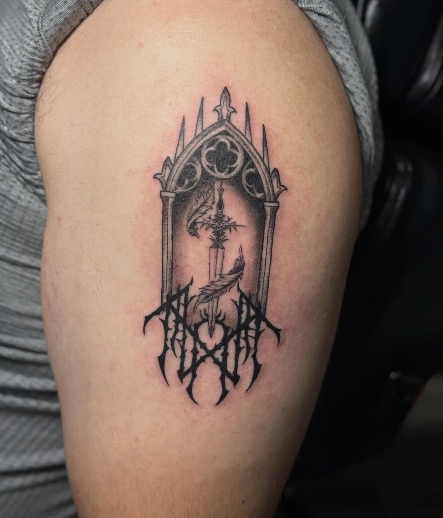 Gothic archway dark realism tattoo on the shoulder by Camryn Justice