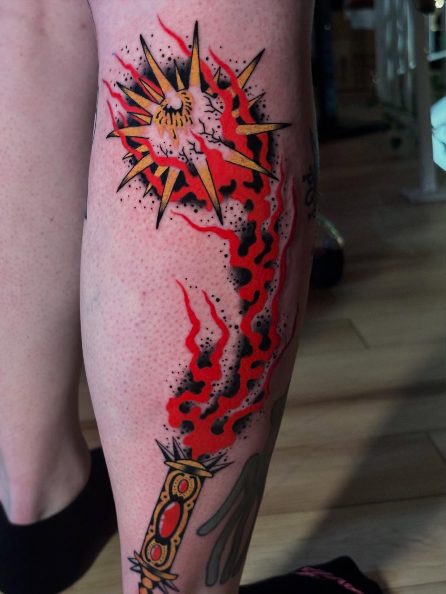 Explosion dotwork tattoo on the calf by Tyler Whalen