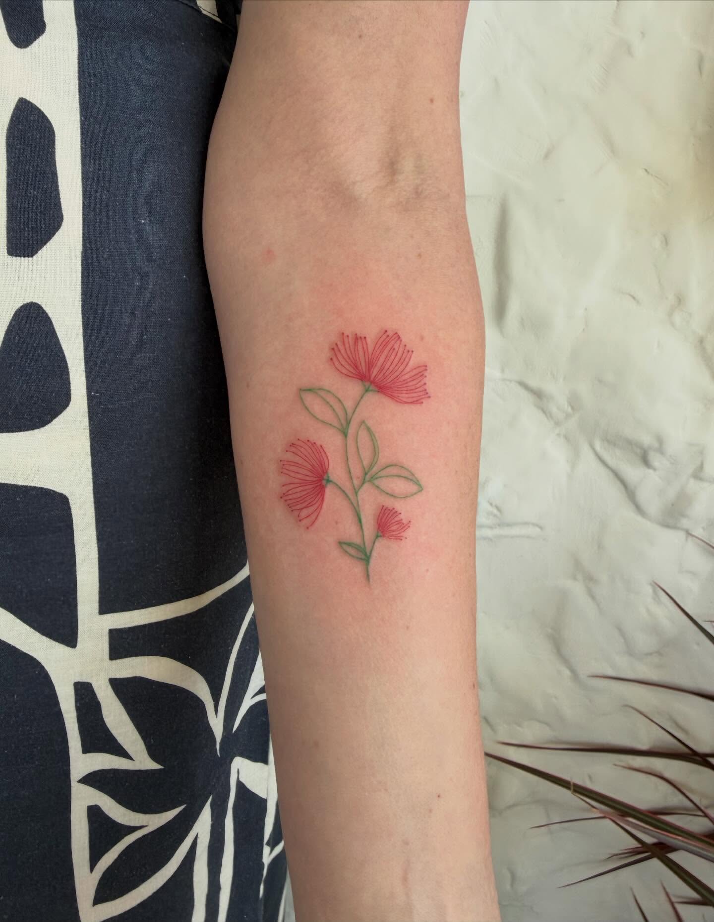 Flowers fine line tattoo on the forearm by Priscila - HAWAII TATTOO