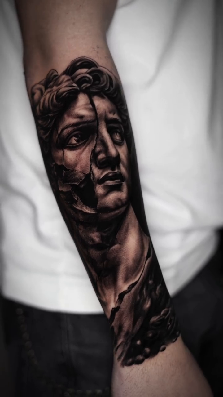 Tattoo by @angelo_tattooink — realism, black_and_grey